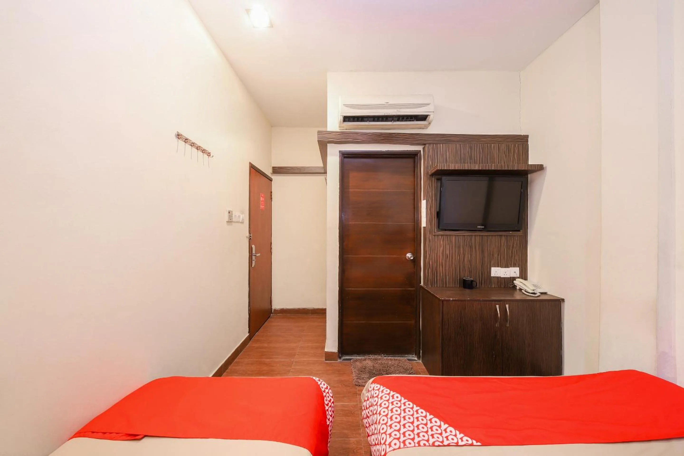 Bedroom in OYO 108 Golden Palace Hotel