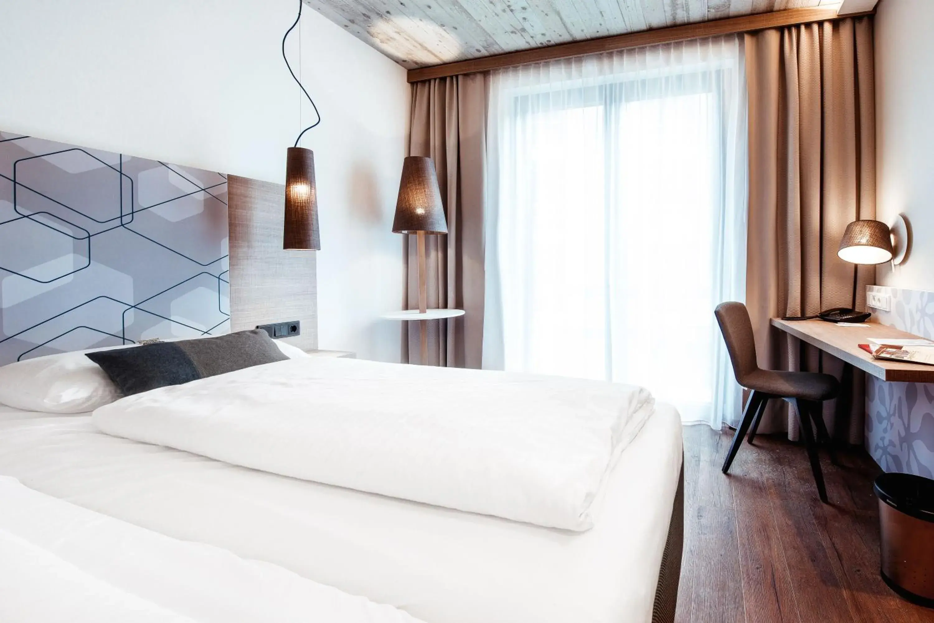 Photo of the whole room, Bed in arte Hotel Kufstein Photo of the whole room, Bed in arte Hotel Kufstein