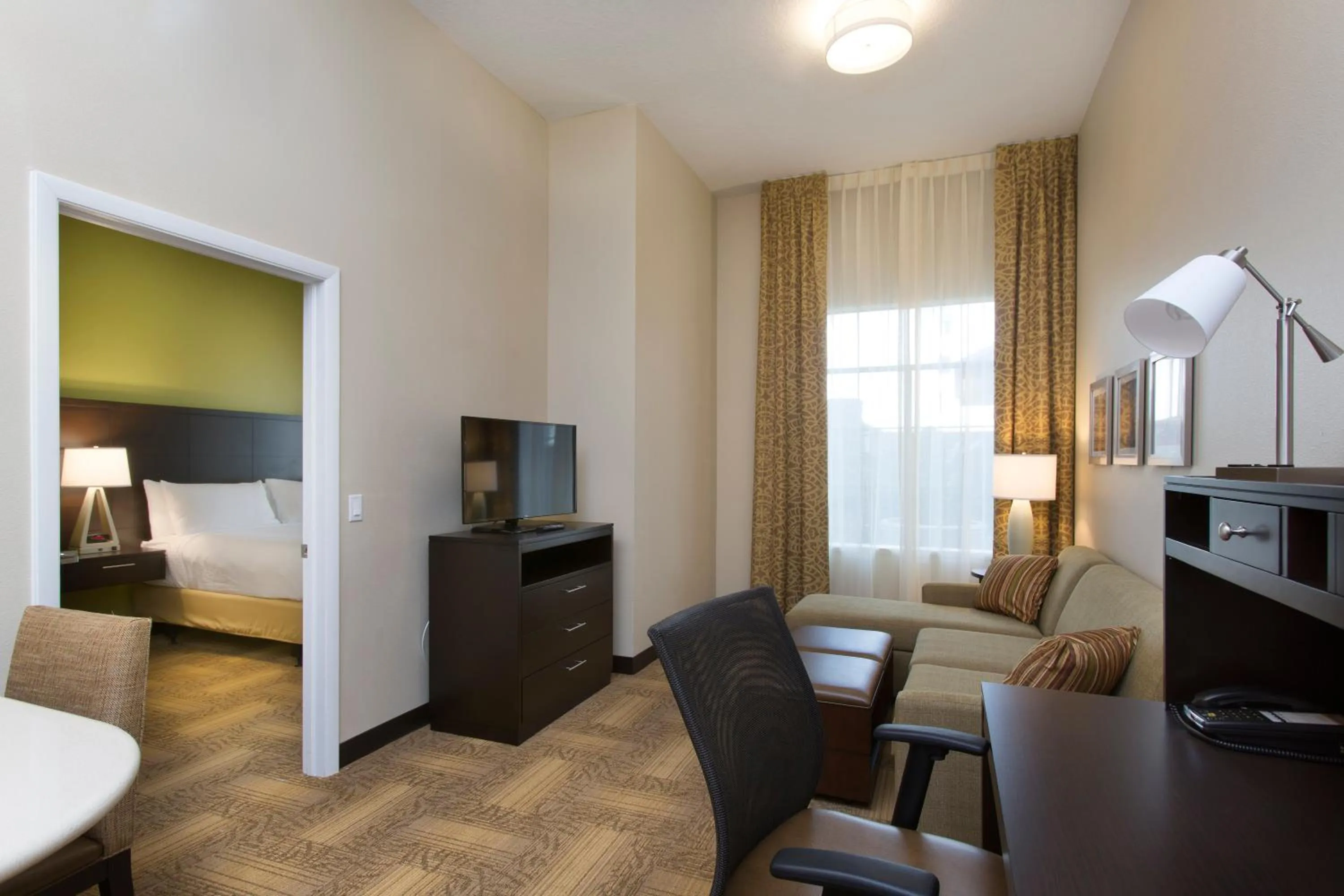 Photo of the whole room in Staybridge Suites Orlando at SeaWorld by IHG - Free Breakfast & Shuttle to SeaWorld Parks