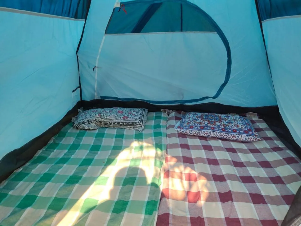 Bed in Whistling Waves Beach Resort