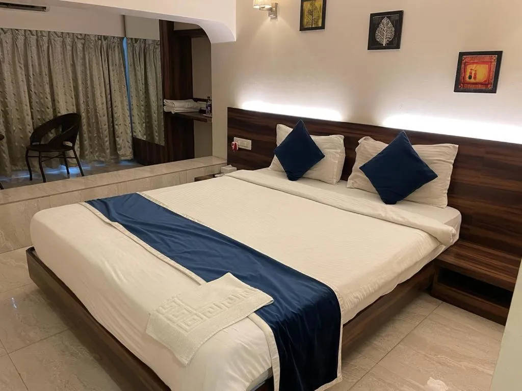 Bed in Hotel Sai Residency