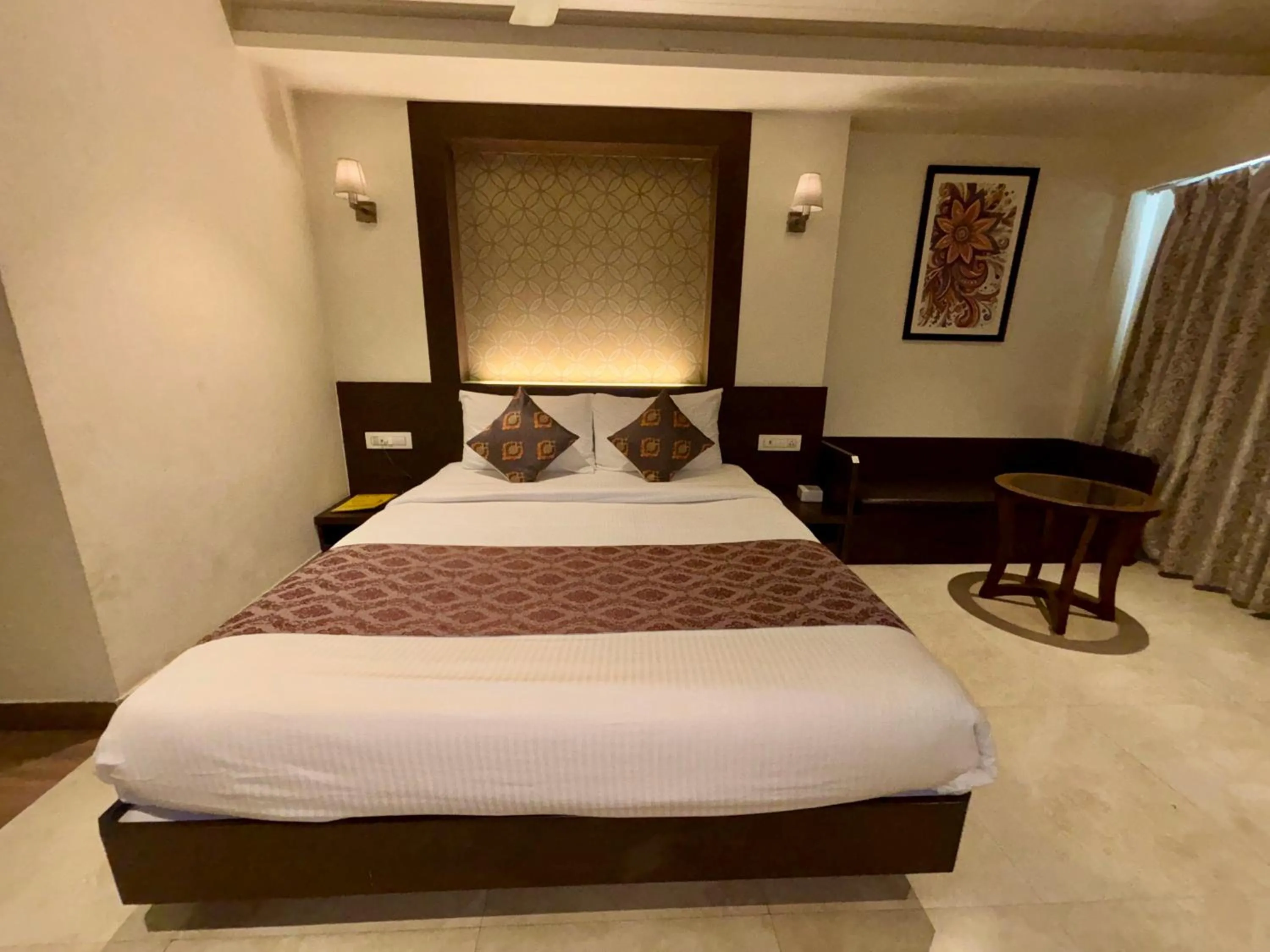 Bed in Hotel Sai Residency