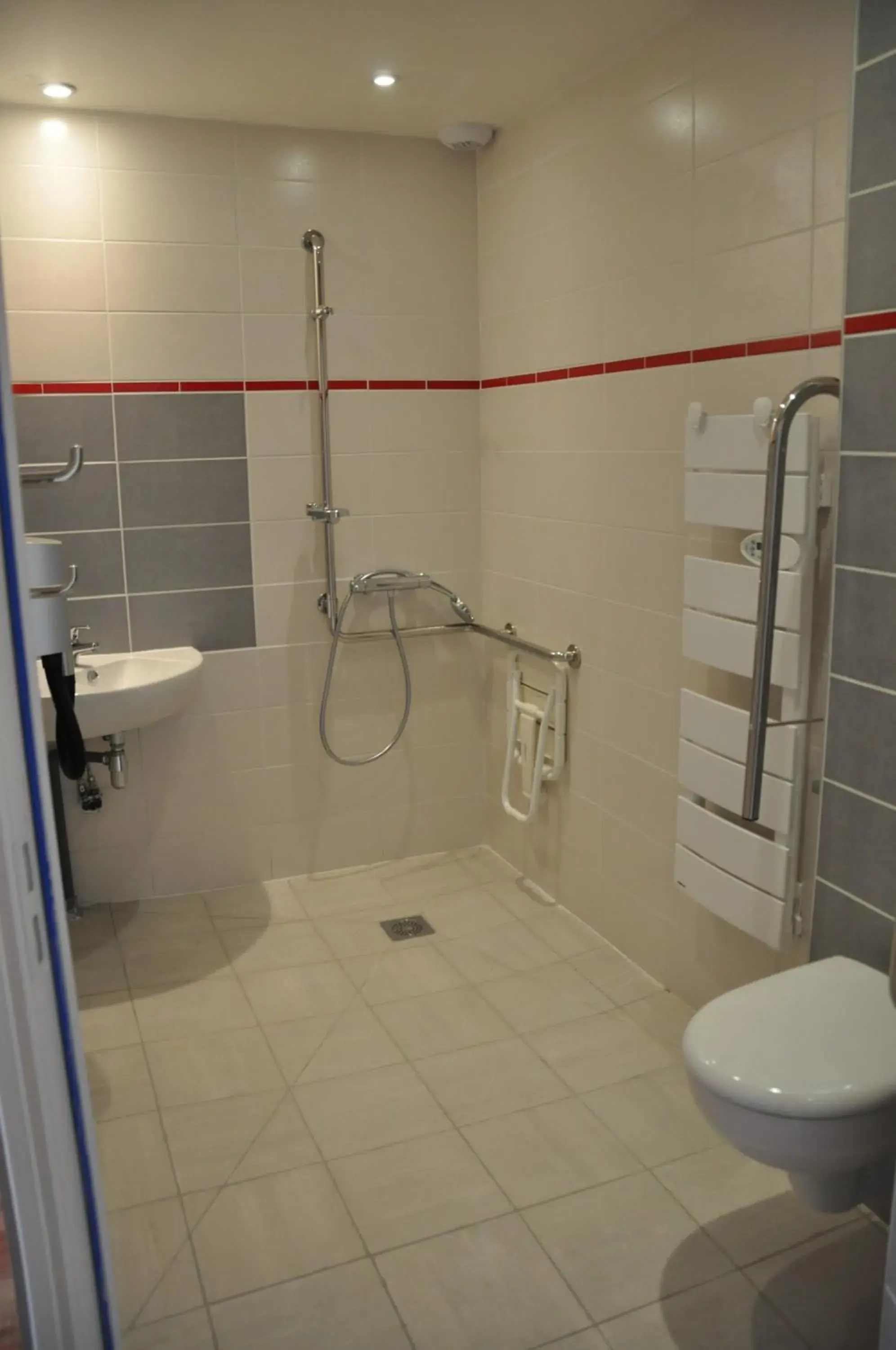 Bathroom in Logis - Hotel & Restaurant La Corne d 'Abondance Bathroom in Logis - Hotel & Restaurant La Corne d 'Abondance