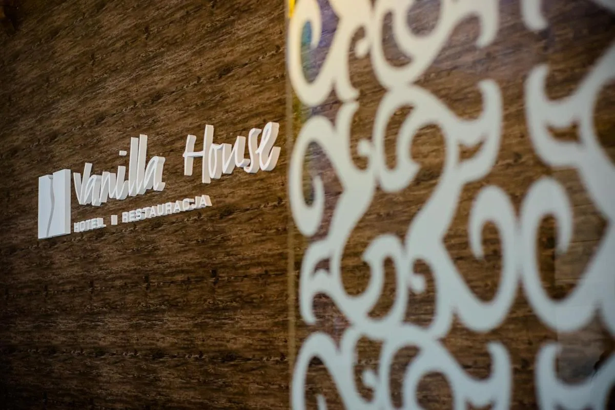 Property logo or sign in Vanilla House