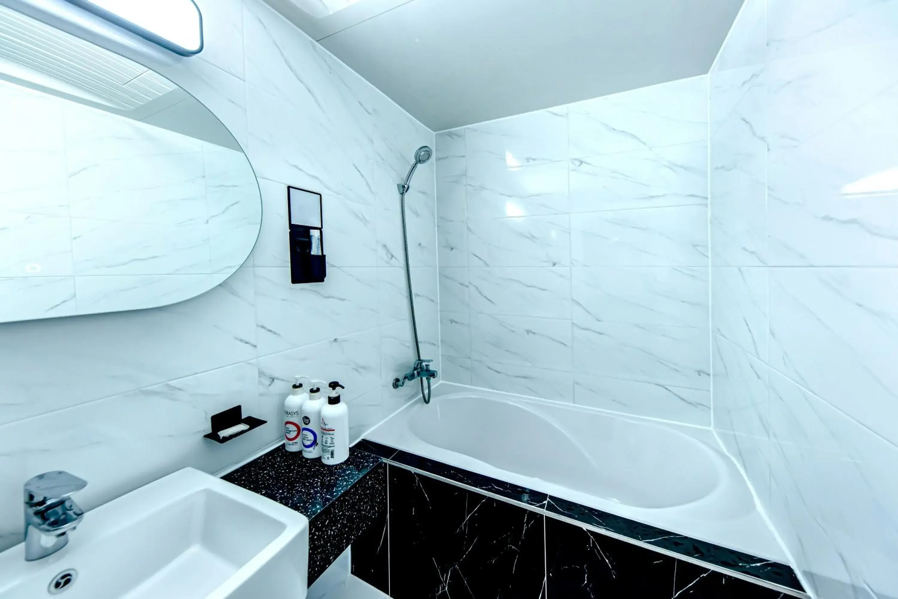 Bathroom in HS Tourist Hotel Bathroom in HS Tourist Hotel