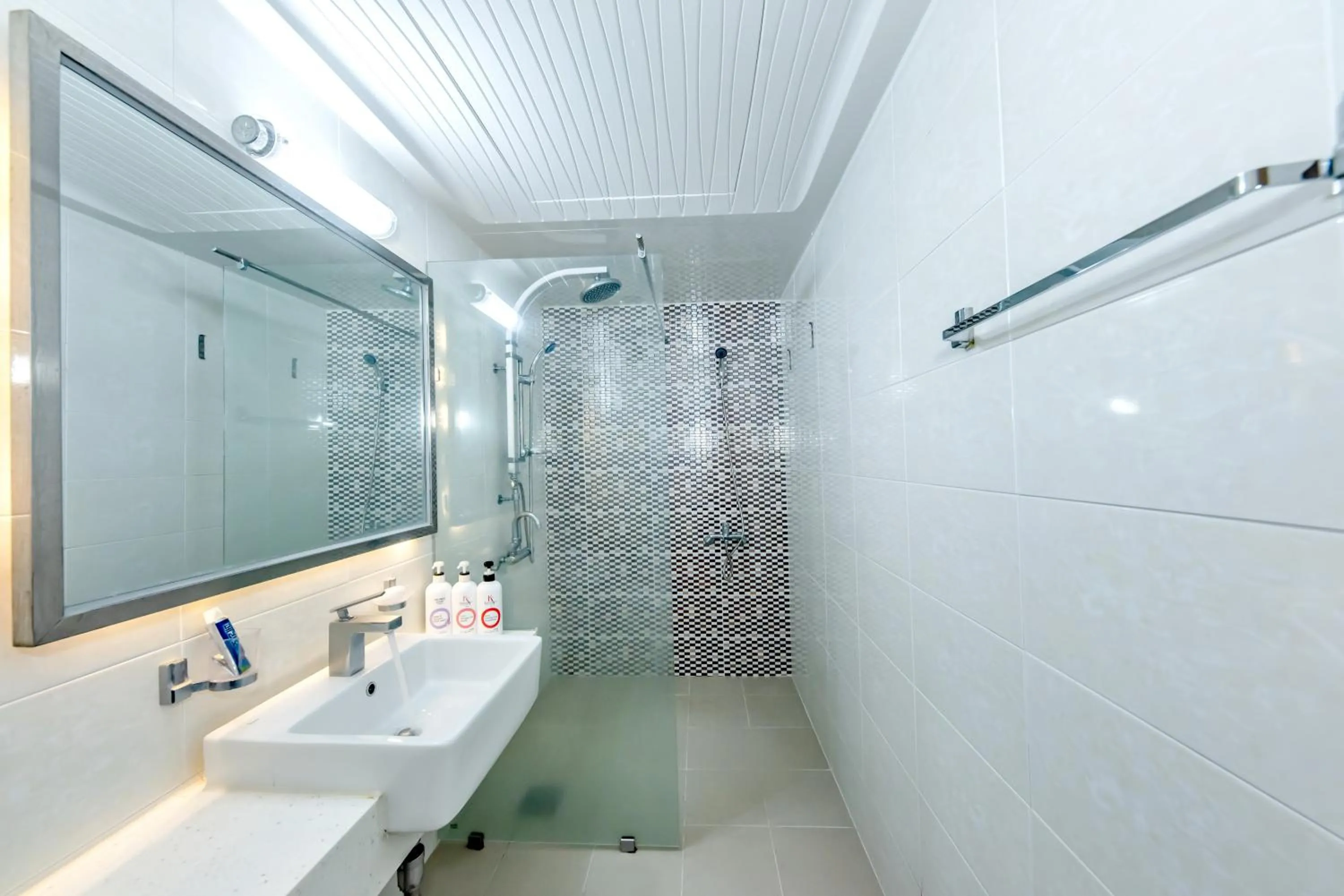 Bathroom in HS Tourist Hotel