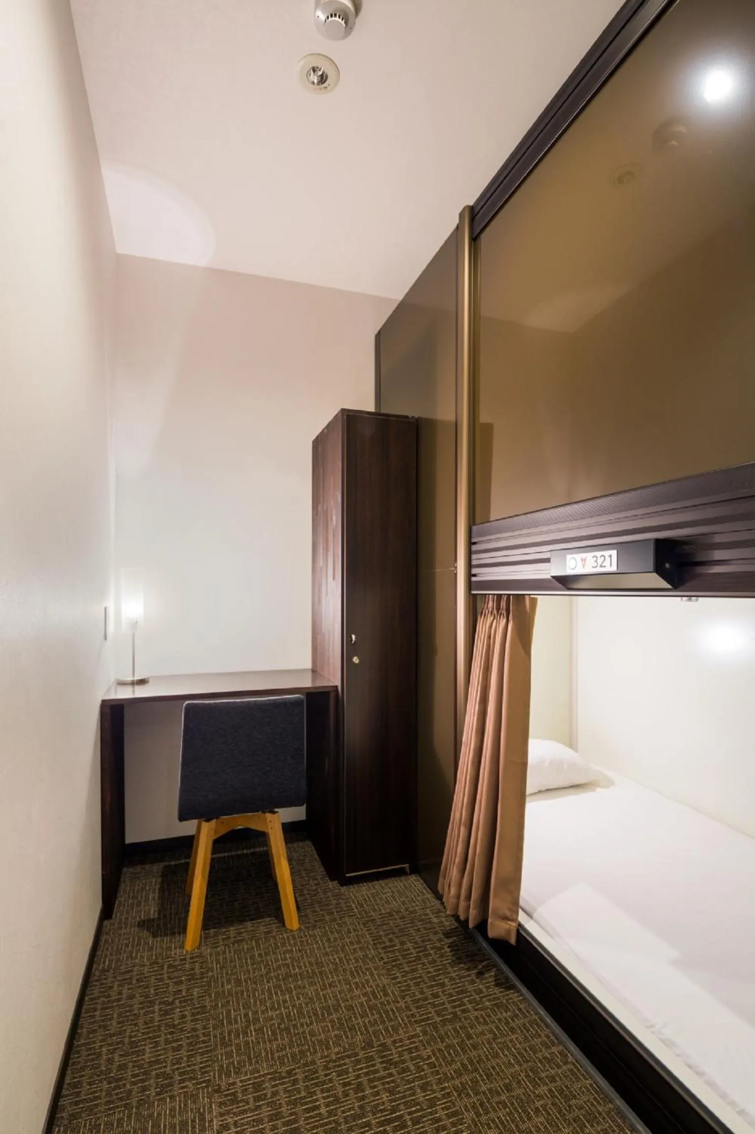 Photo of the whole room, Bed in Capsule Hotel Cube Hiroshima