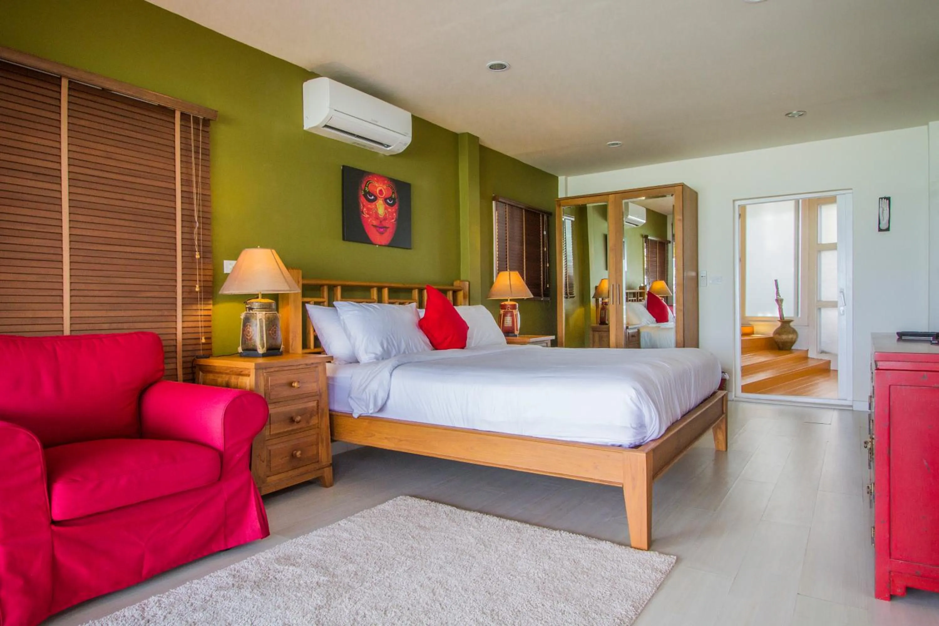 Seating area, Bed in Boujis Boutique Resort