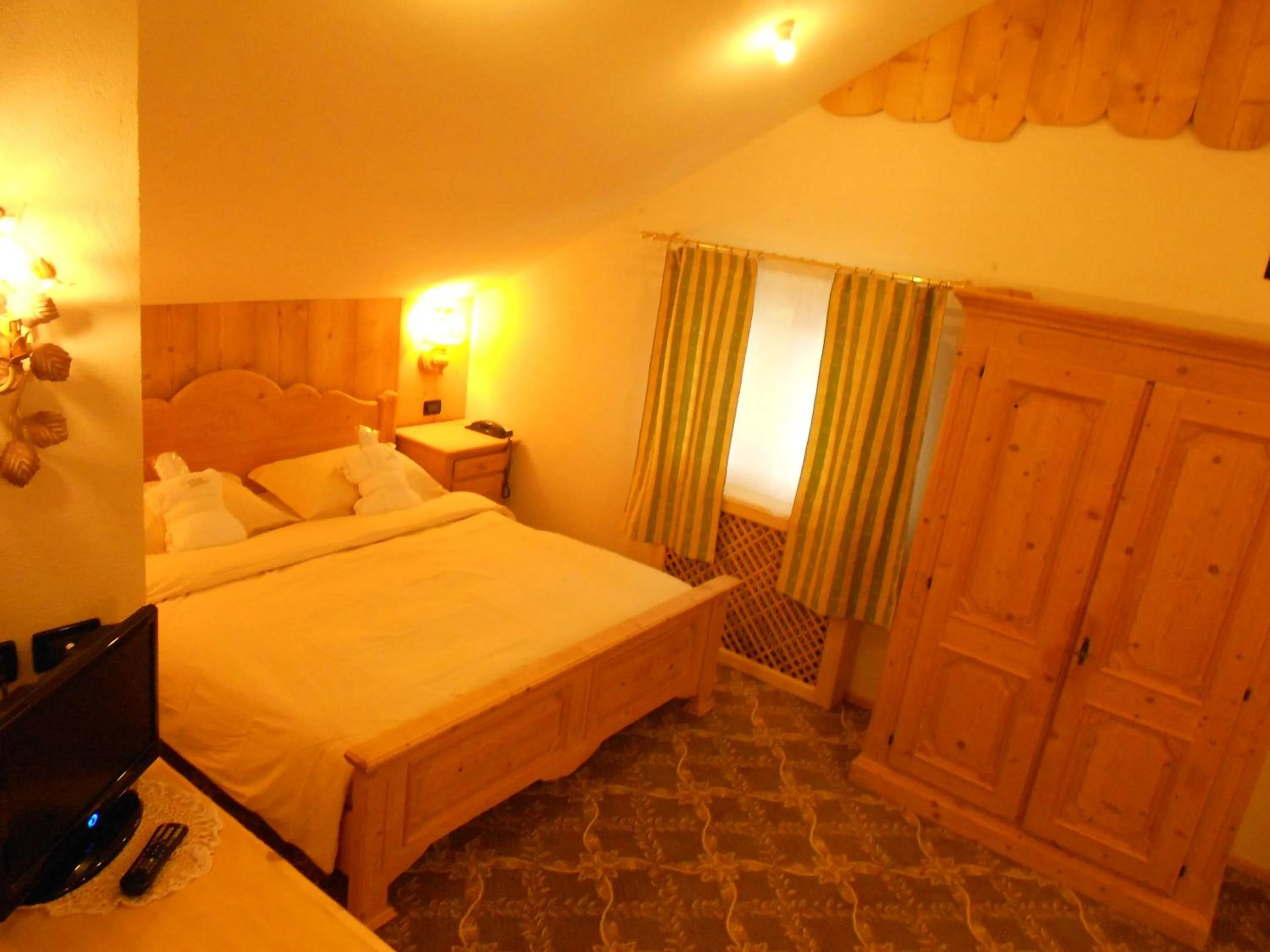 Photo of the whole room, Bed in Hotel Relais Grünwald