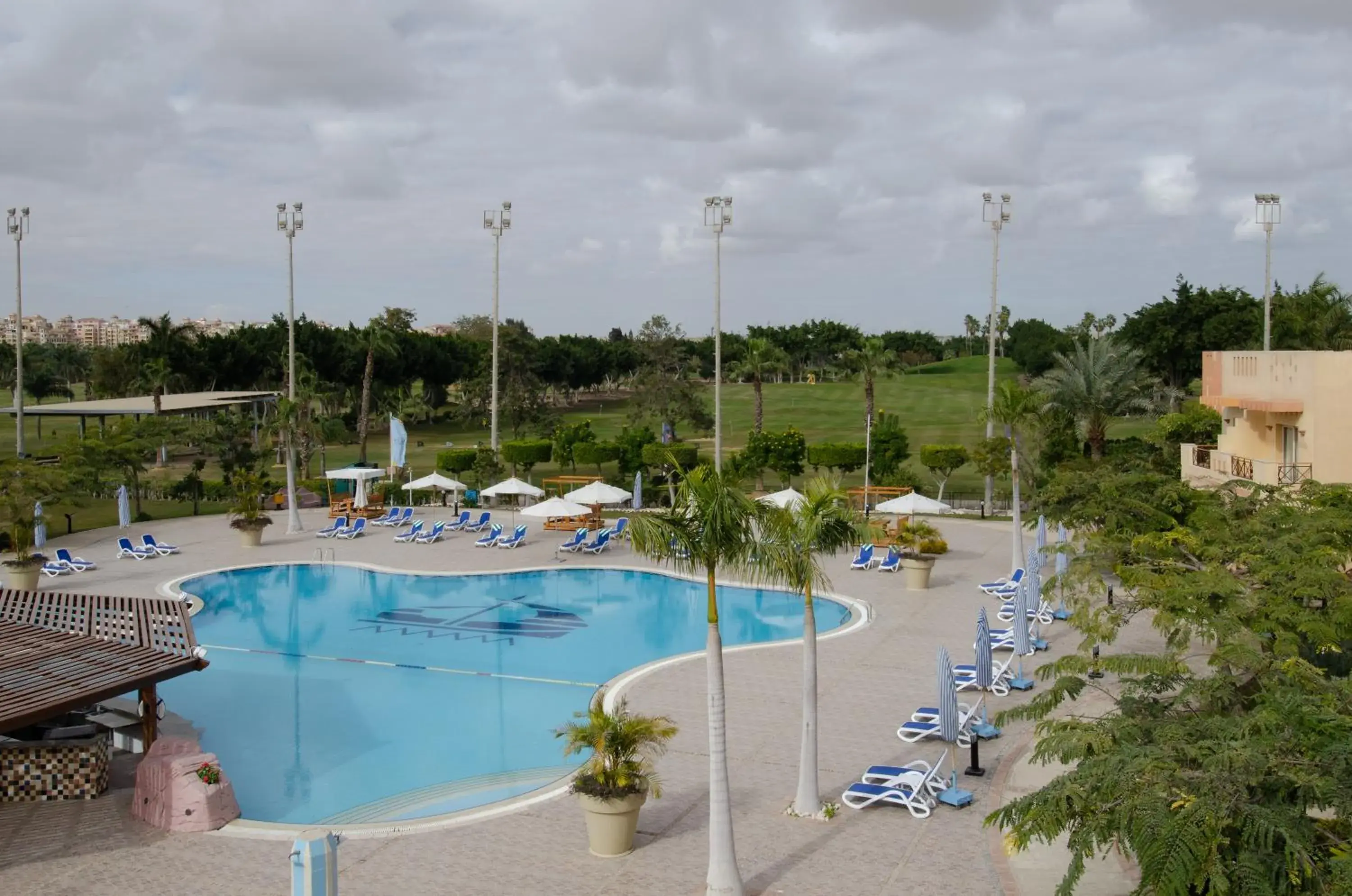 Swimming pool in Swiss Inn Pyramids Golf Resort Swimming pool in Swiss Inn Pyramids Golf Resort