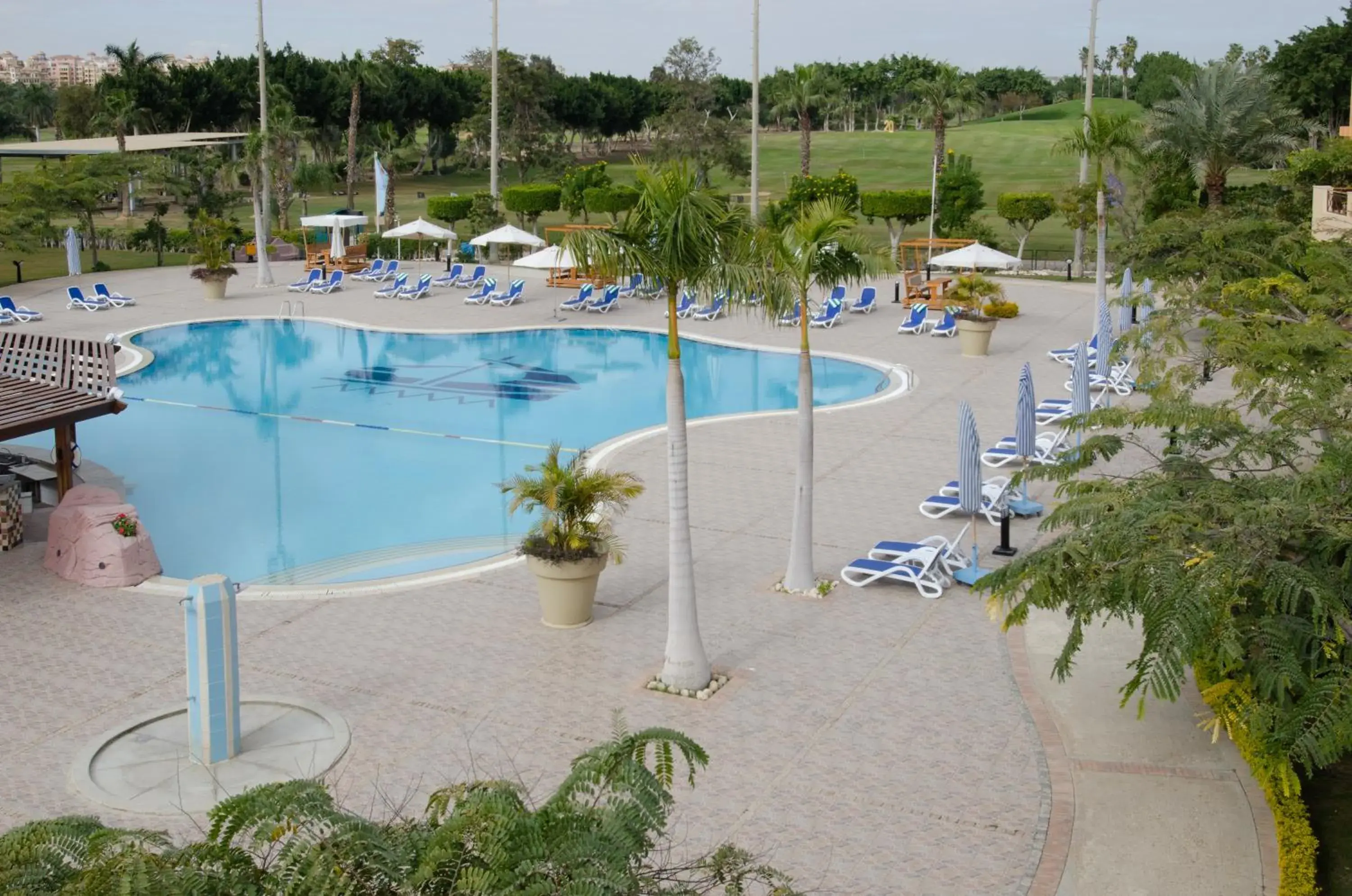 Swimming pool in Swiss Inn Pyramids Golf Resort Swimming pool in Swiss Inn Pyramids Golf Resort