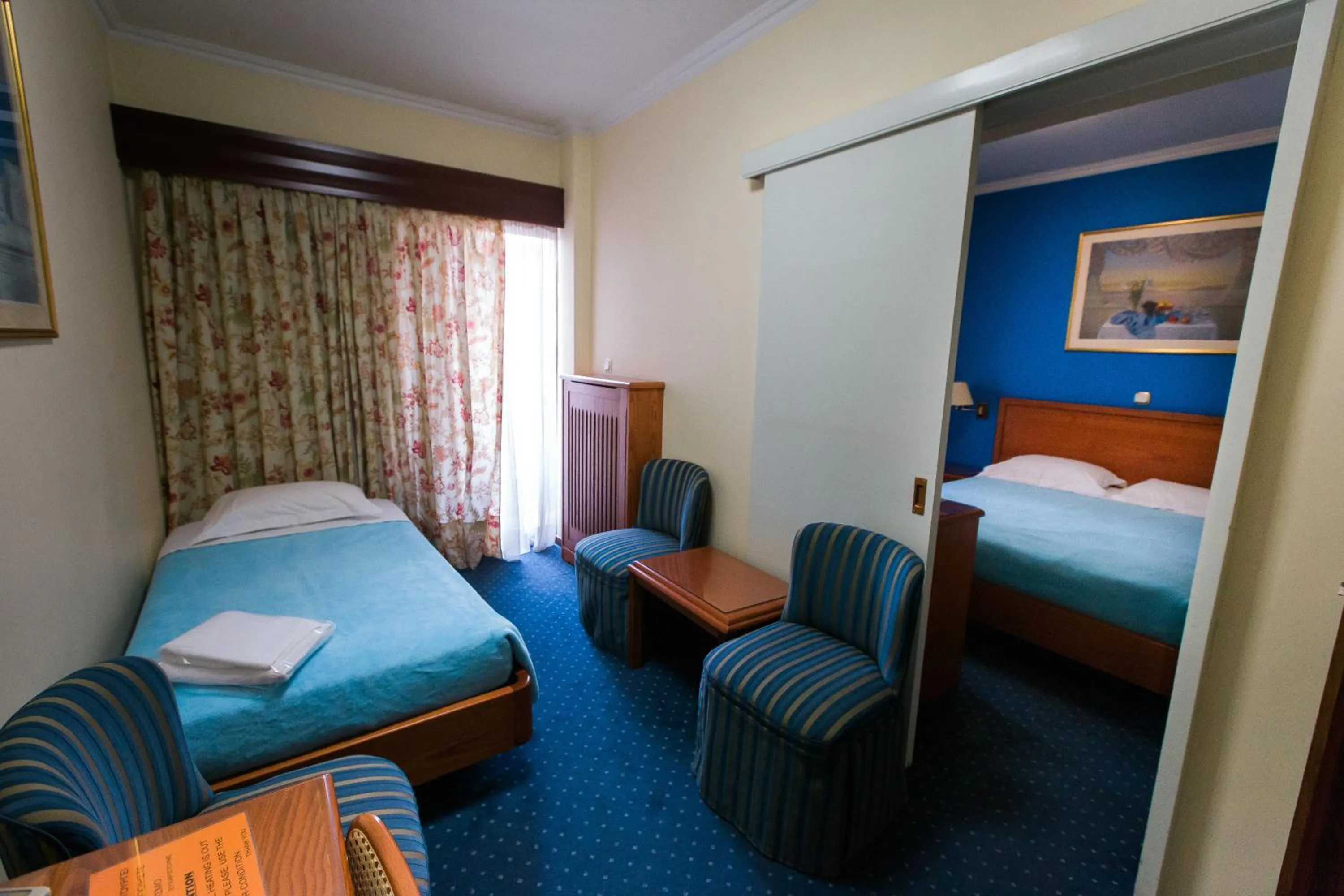 Toilet, Bed in Grand Hotel