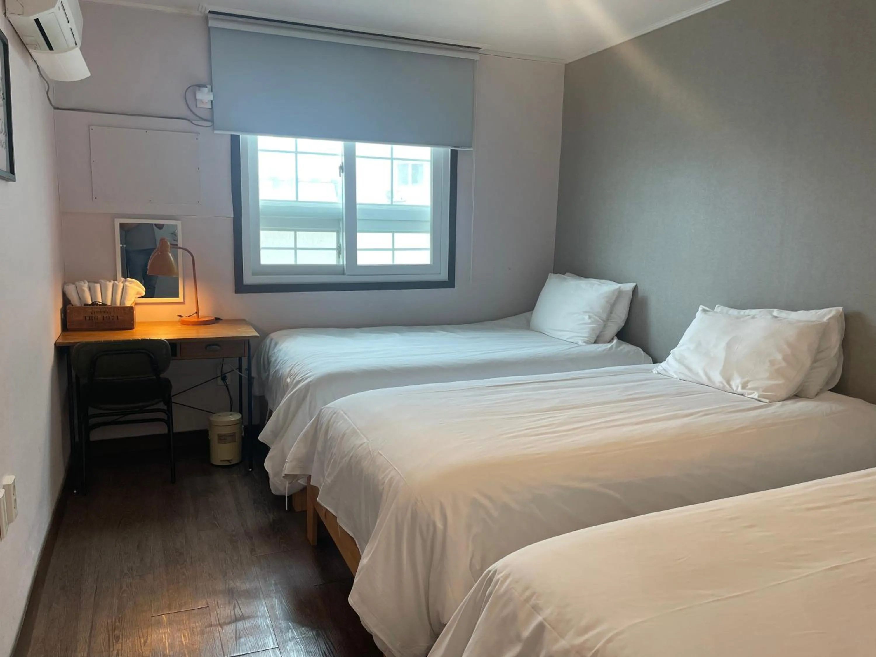 Bed in Grim Garden Guesthouse