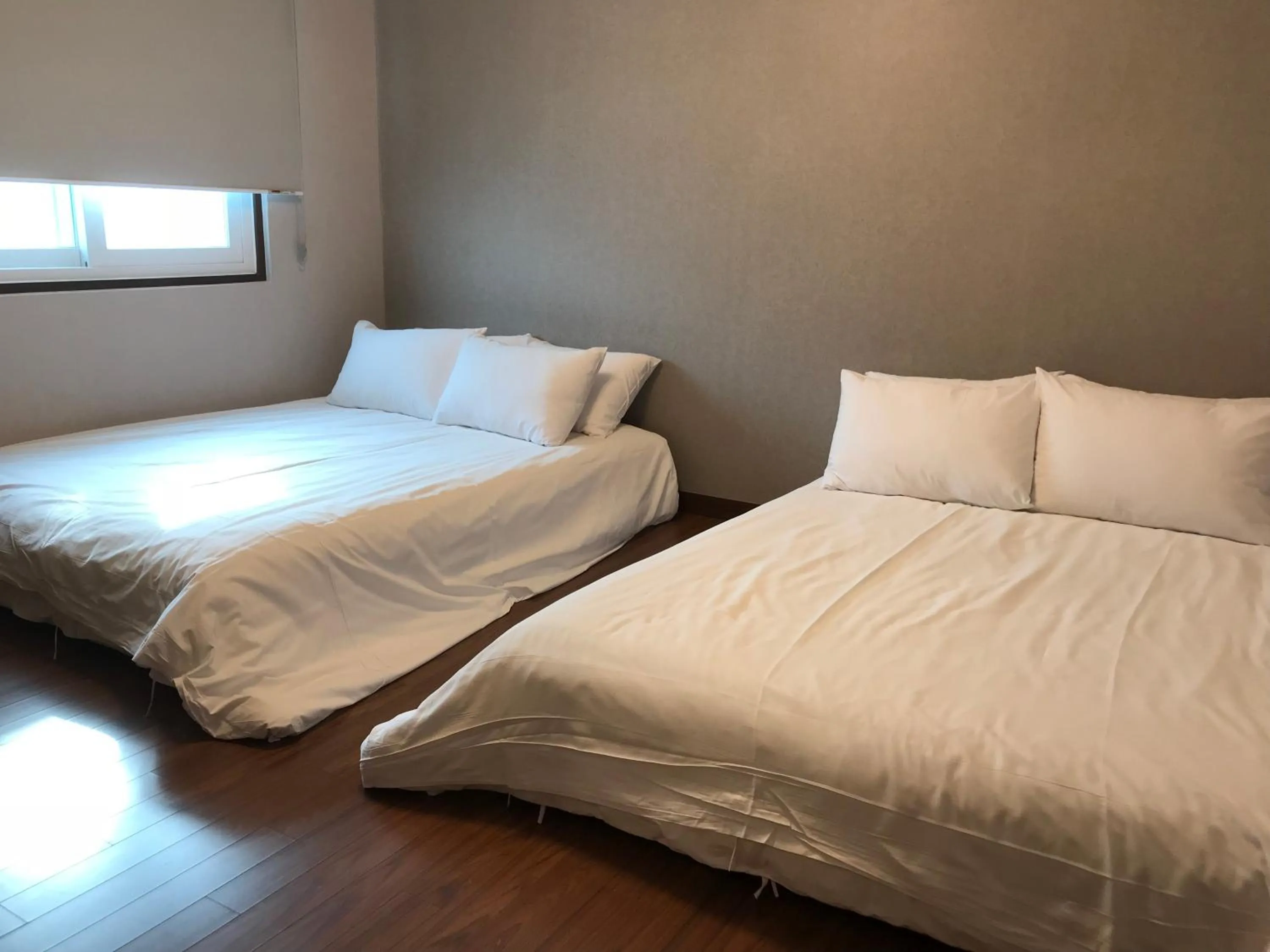 Bed in Grim Garden Guesthouse