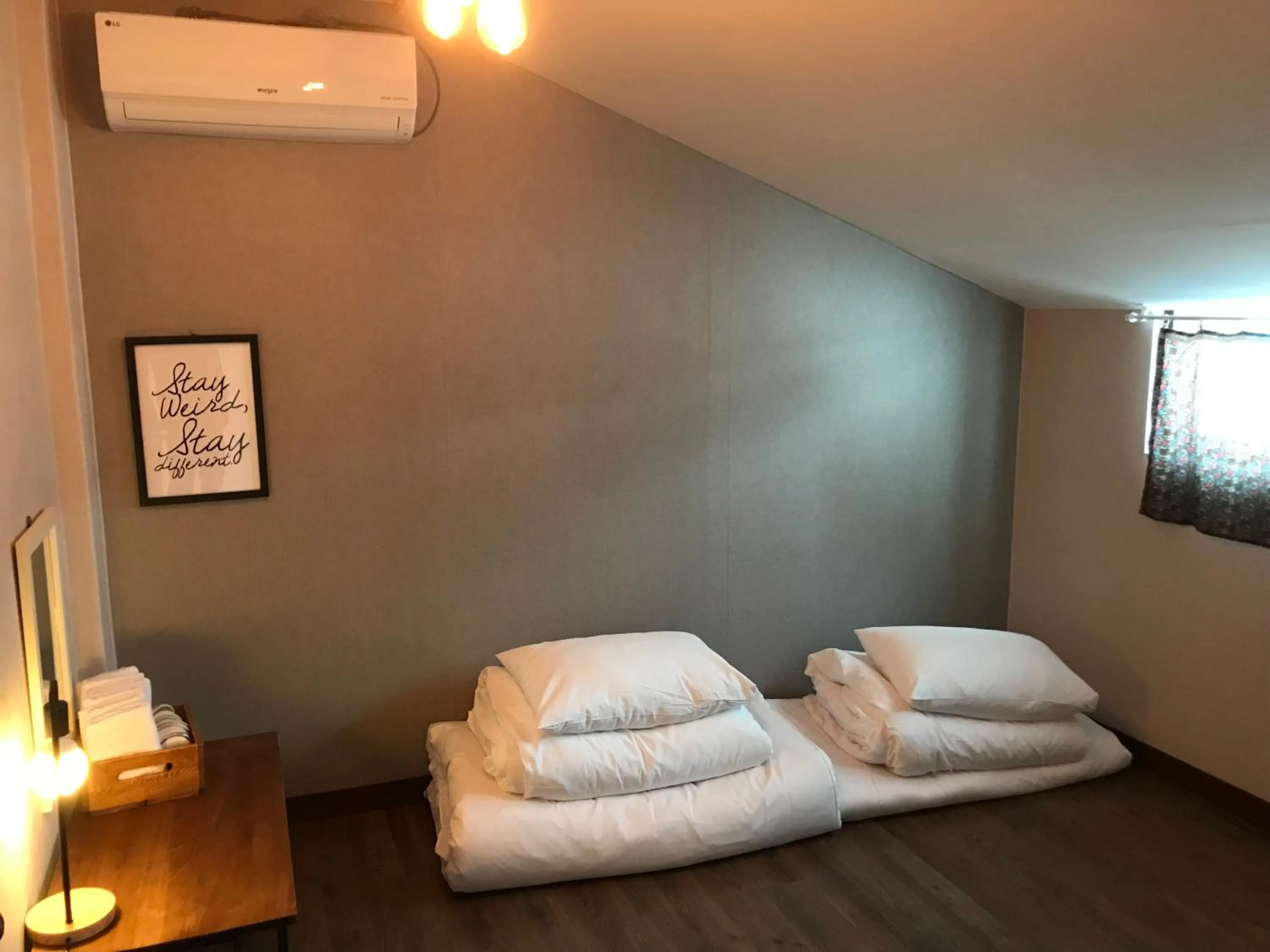 Bed in Grim Garden Guesthouse