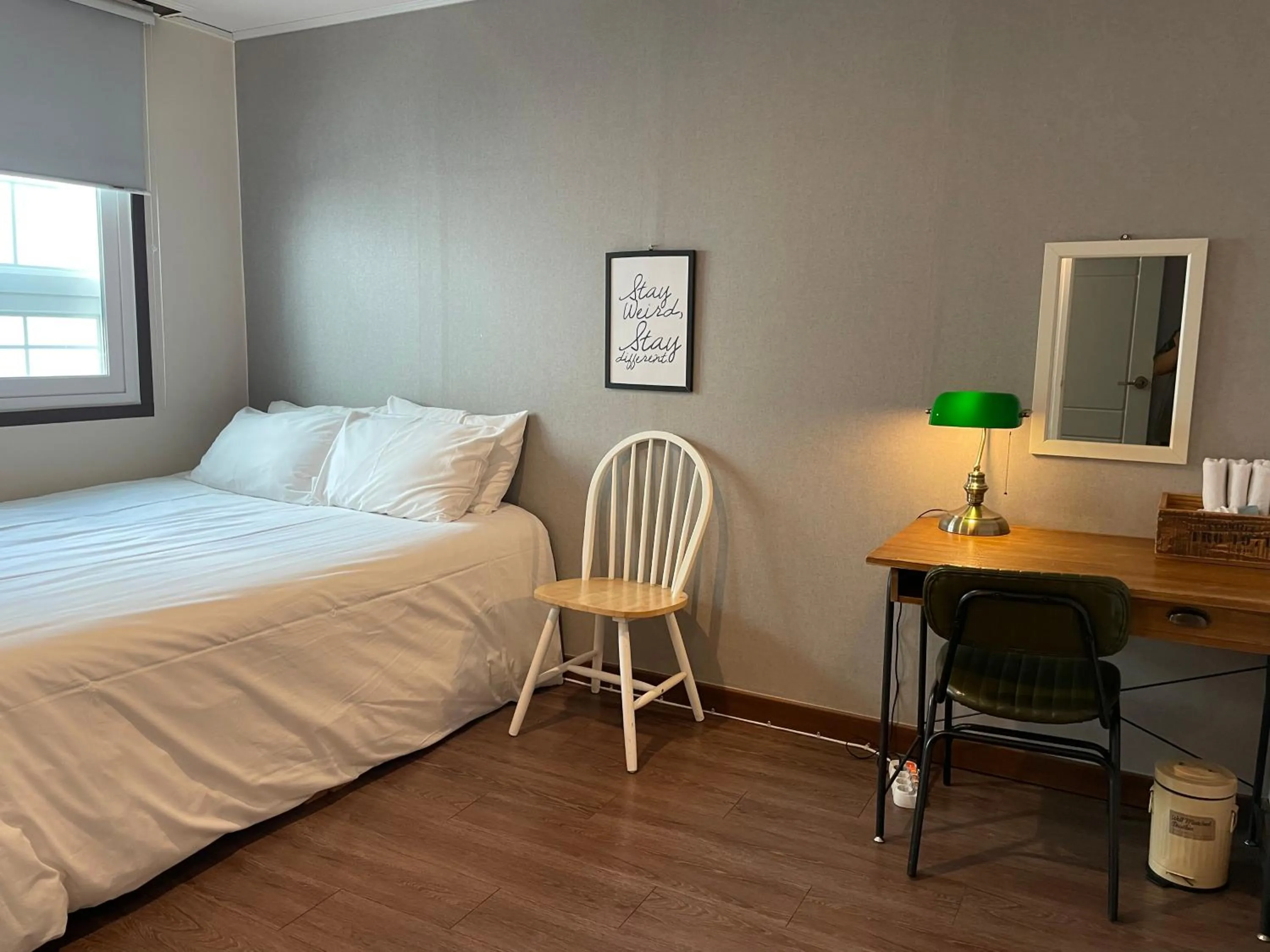 Bed in Grim Garden Guesthouse