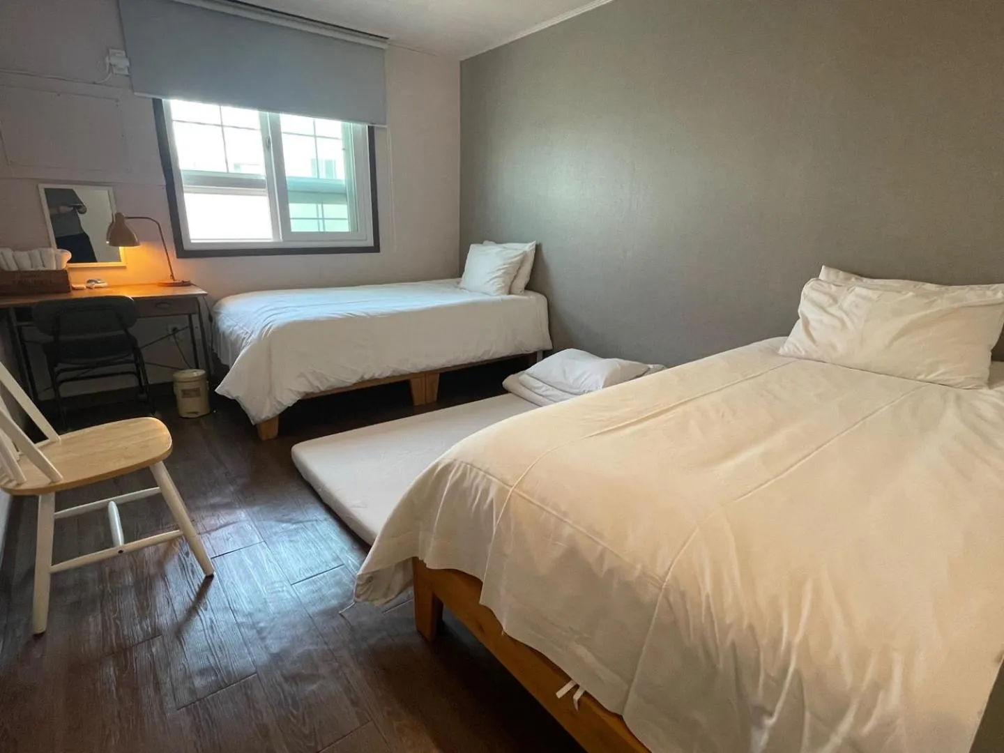 Bed in Grim Garden Guesthouse