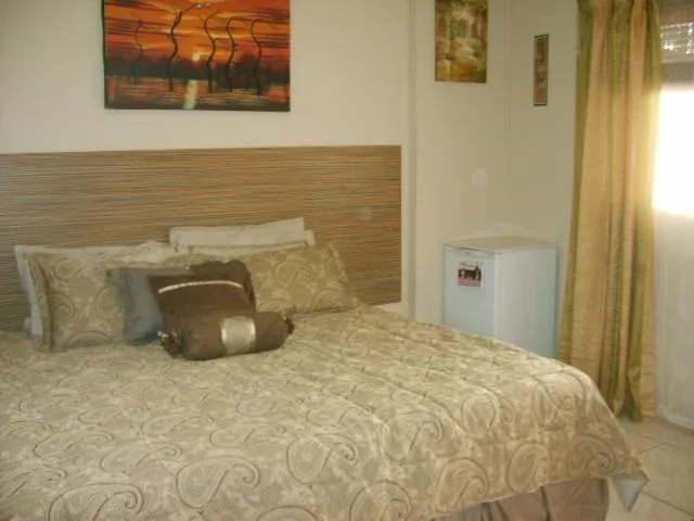 Bed in All Are Welcome Guest House