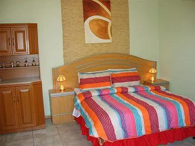Bed in All Are Welcome Guest House