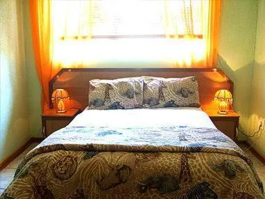 Bed in All Are Welcome Guest House