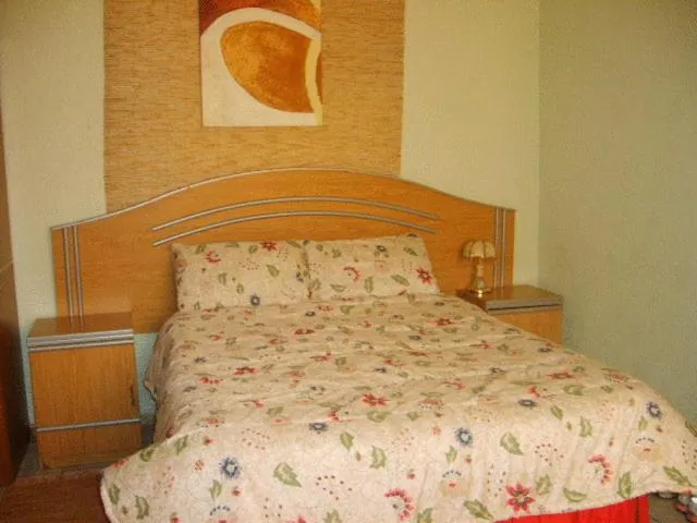 Bed in All Are Welcome Guest House
