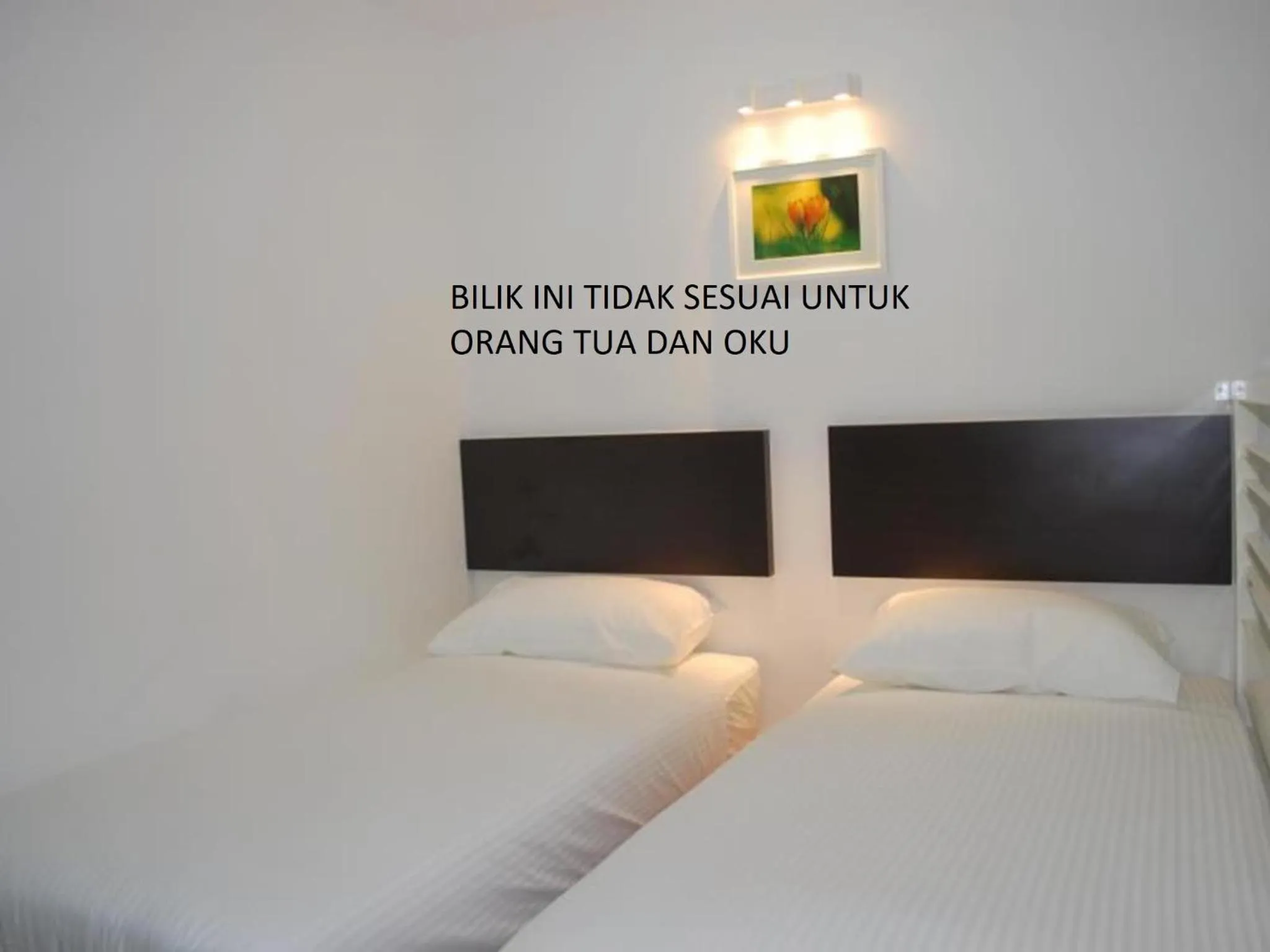 Bed in Apple Inn Hotel