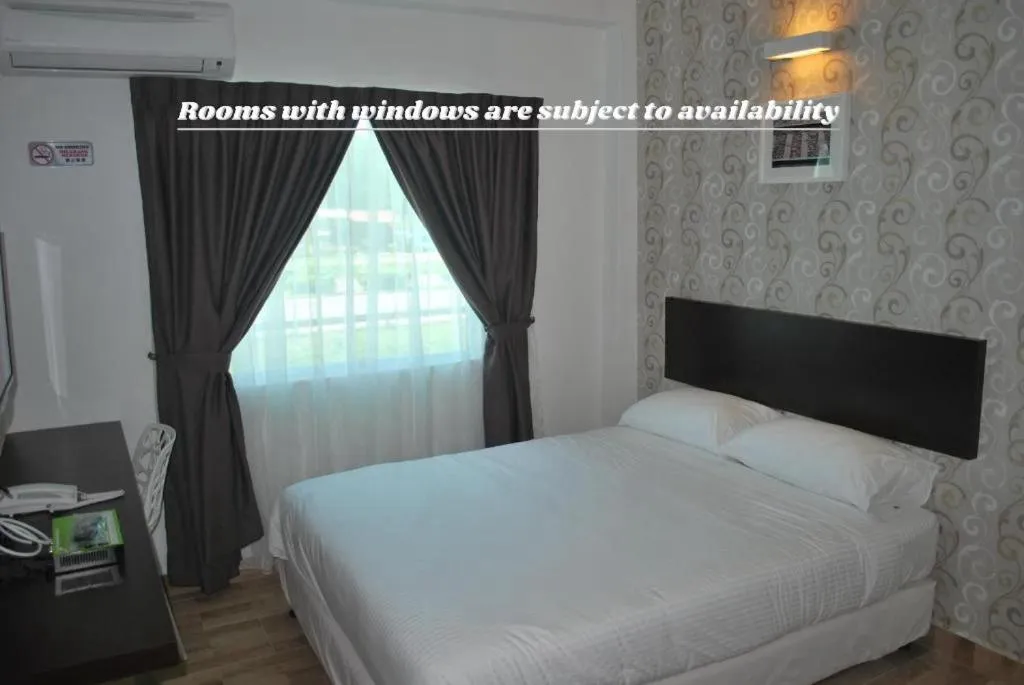 Bed in Apple Inn Hotel