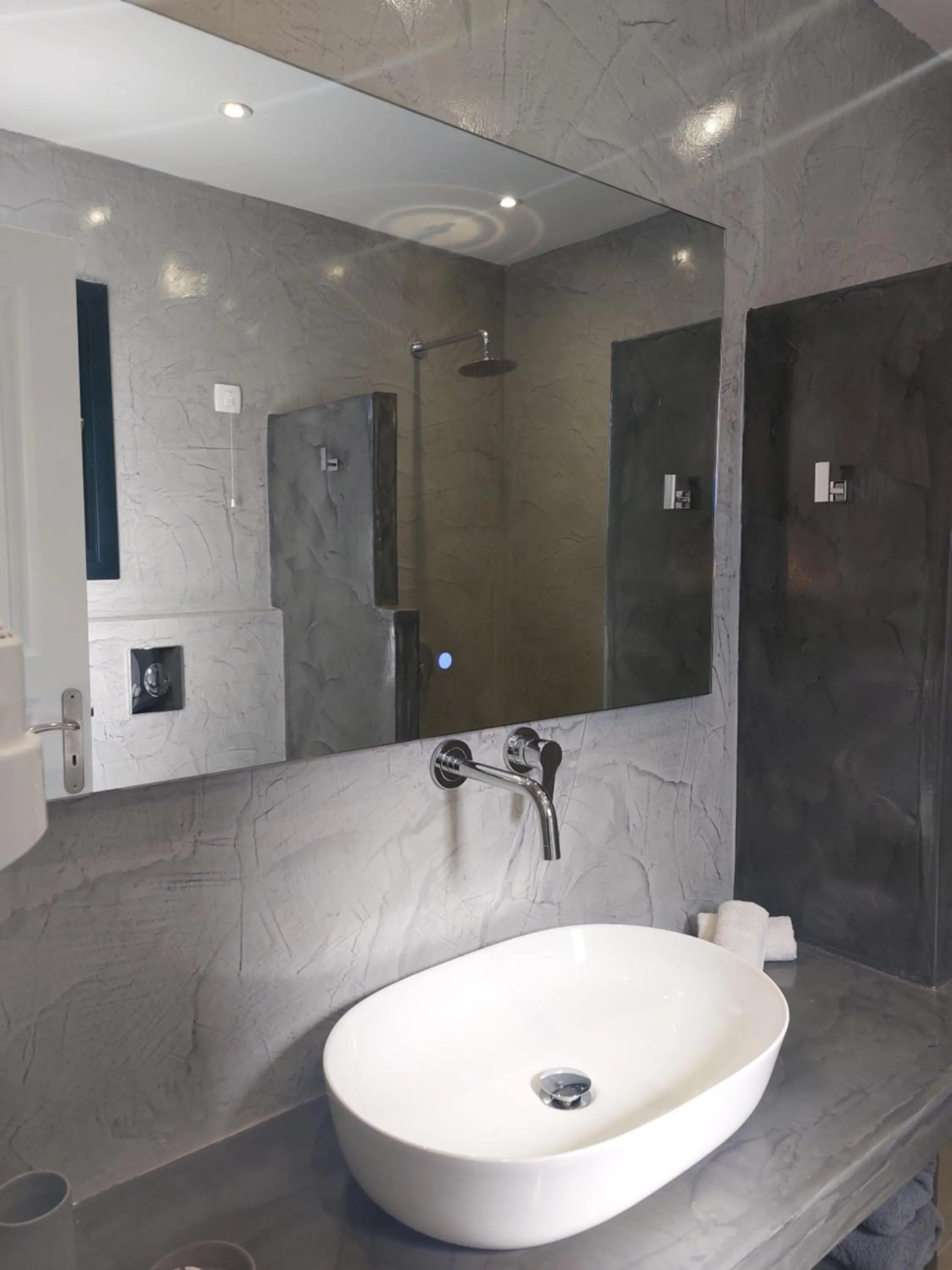 Bathroom in Anthonas Apartments