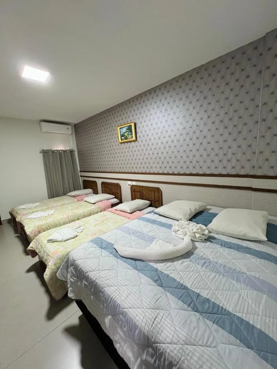 air conditioner, Bed in Tulipa Hotel