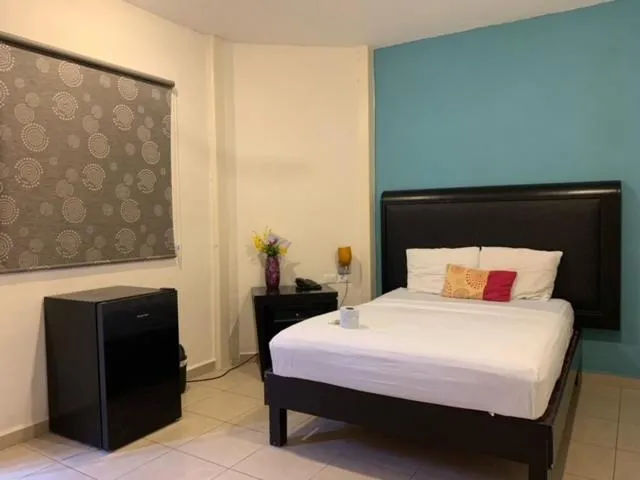 Bed in Hotel Real San Juan Suites