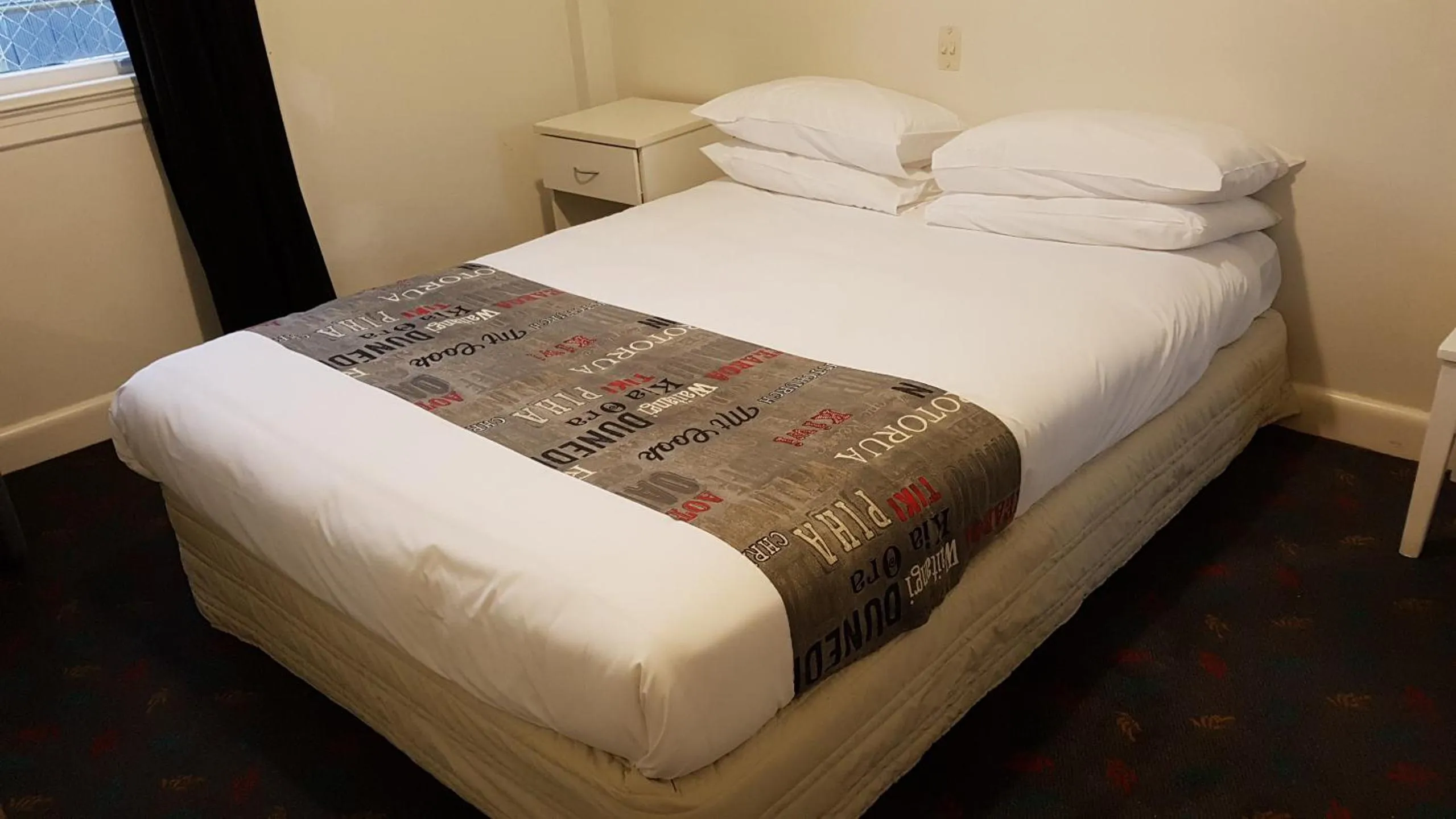 Bed in Whakatane Hotel