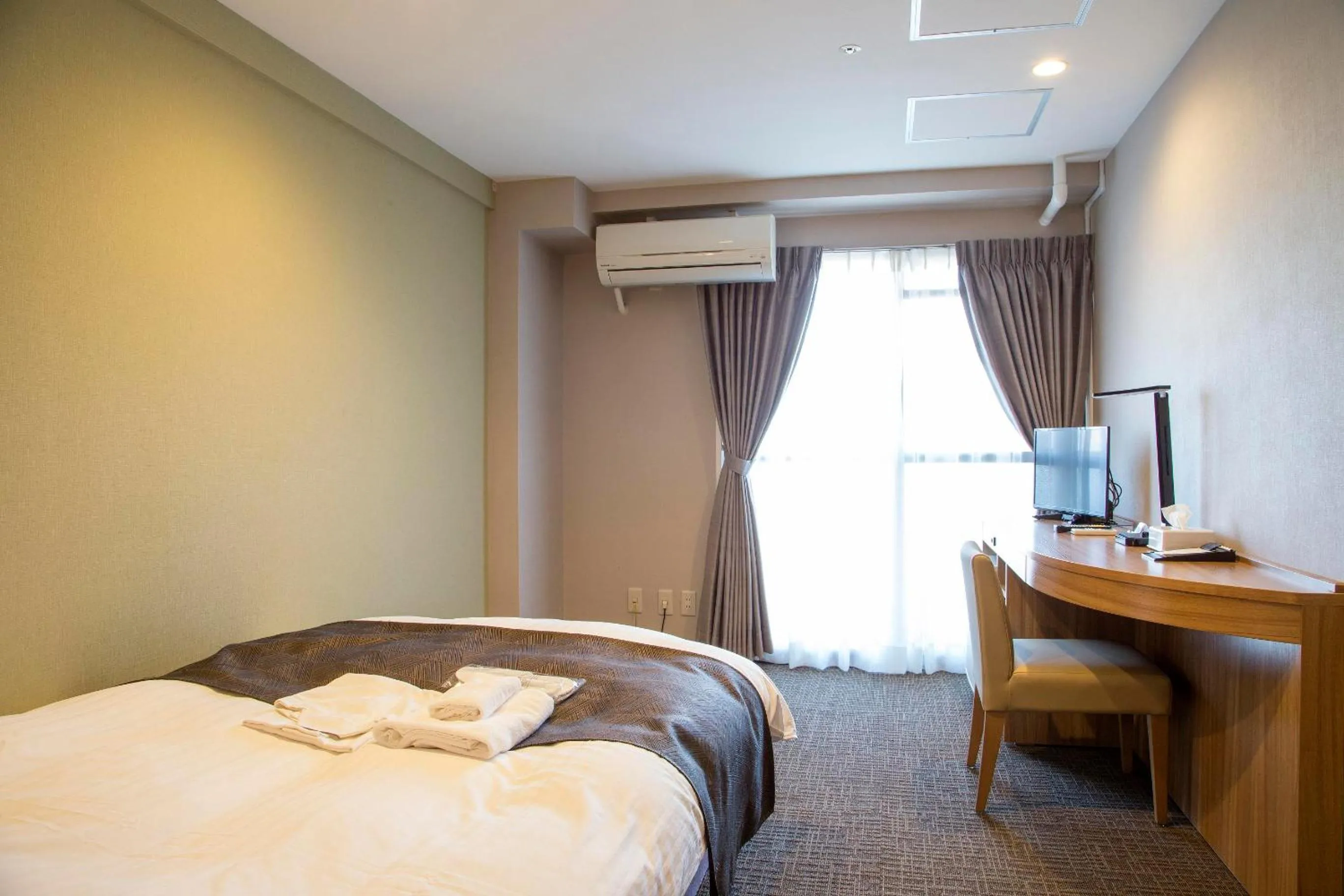 Photo of the whole room, Bed in HOTEL CITY INN WAKAYAMA Wakayama-Ekimae