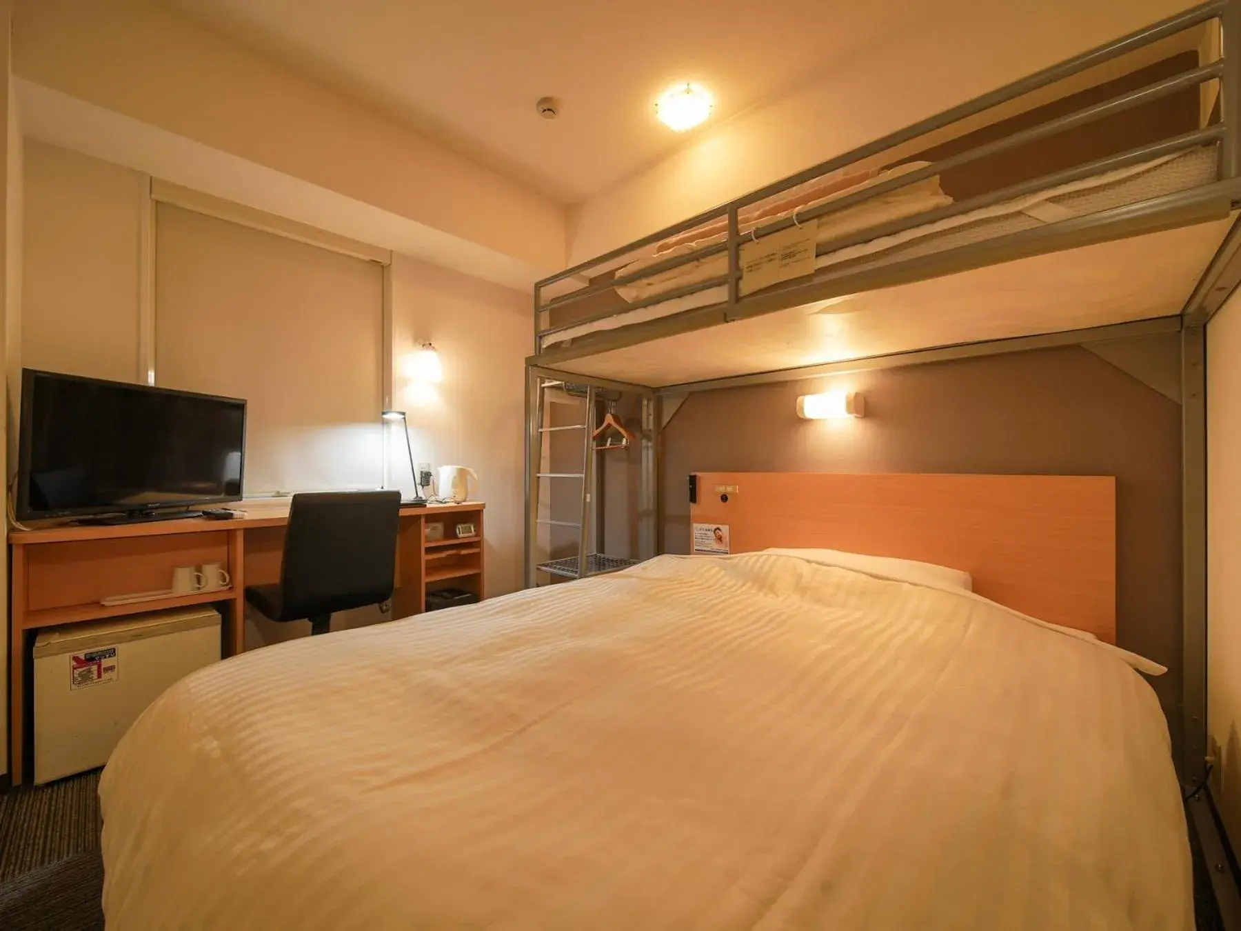 Bed in Super Hotel Kokuraeki Minamiguchi Bed in Super Hotel Kokuraeki Minamiguchi