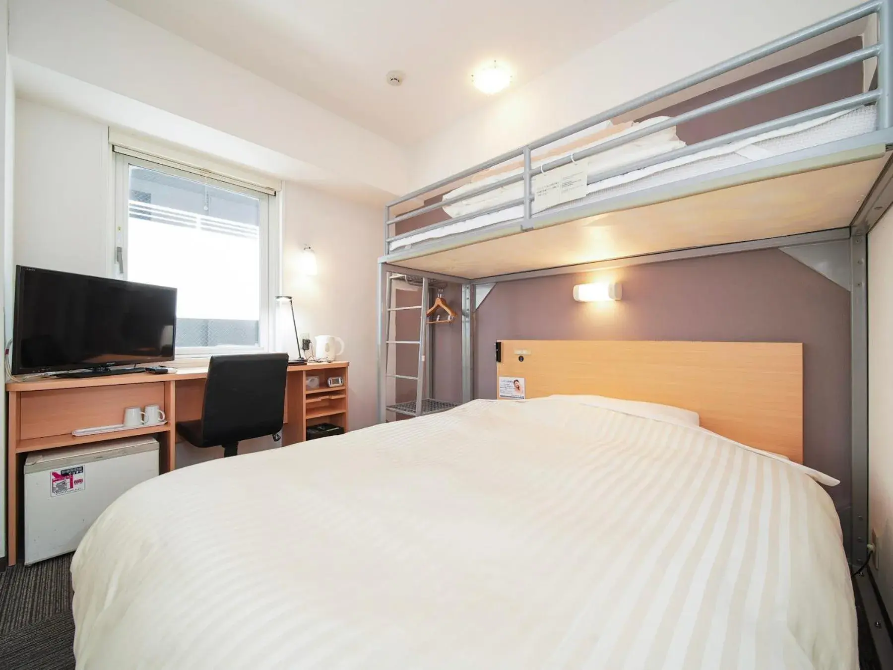 Bed in Super Hotel Kokuraeki Minamiguchi Bed in Super Hotel Kokuraeki Minamiguchi