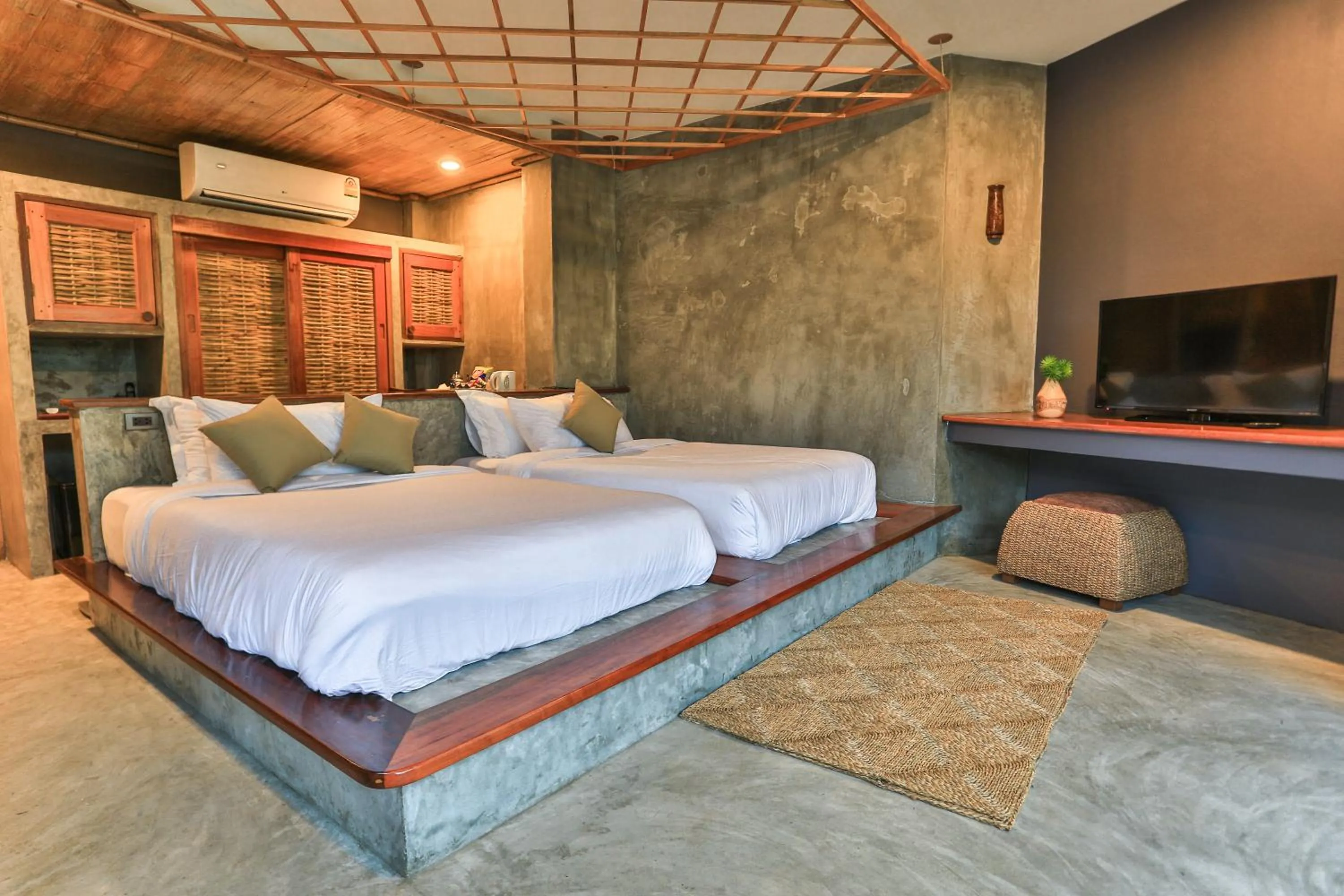 Bed in Sai Daeng Resort