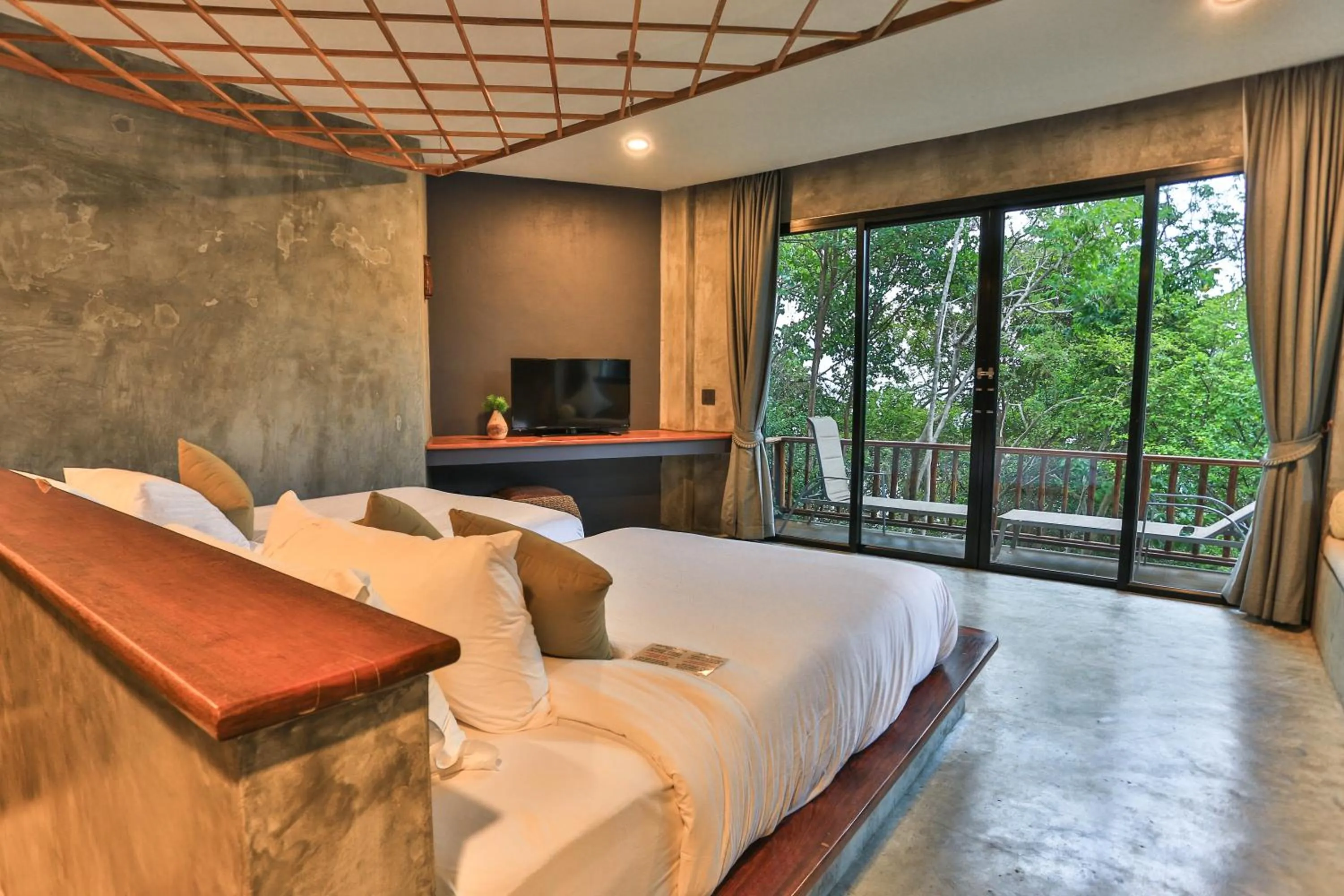 Bed in Sai Daeng Resort
