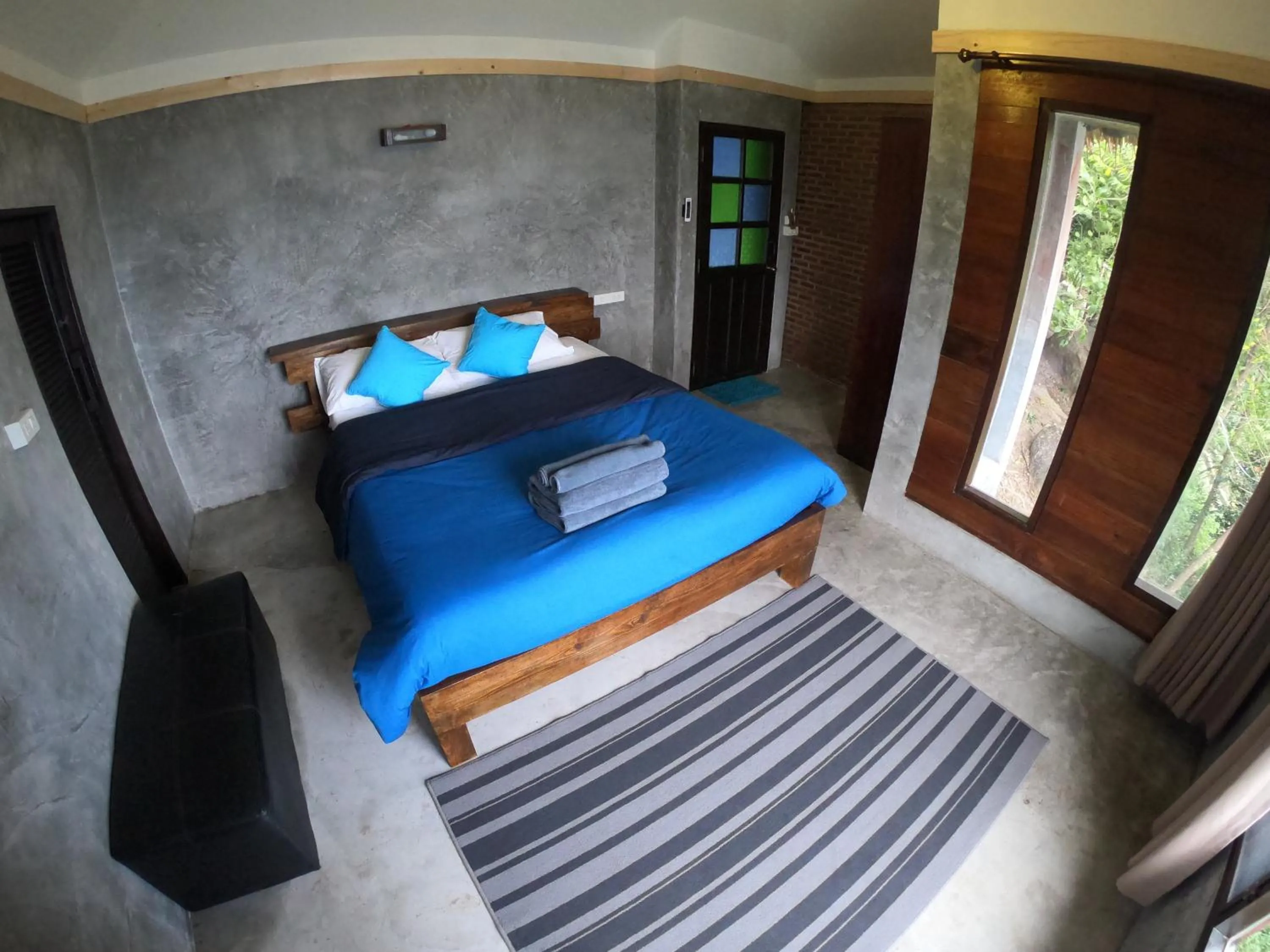 Bed in Blue Heaven Resort Koh Tao