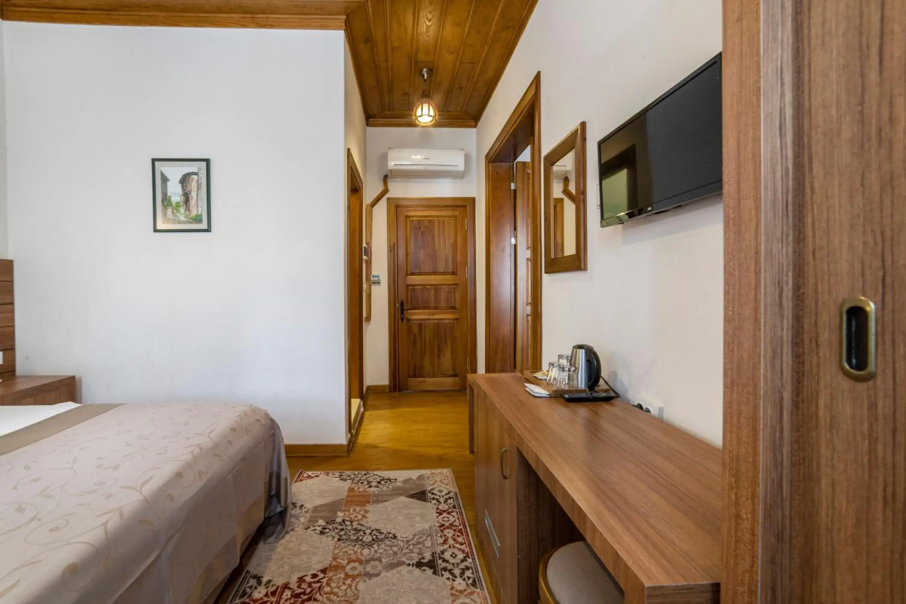 Bed in Armistis Hotel Bed in Armistis Hotel