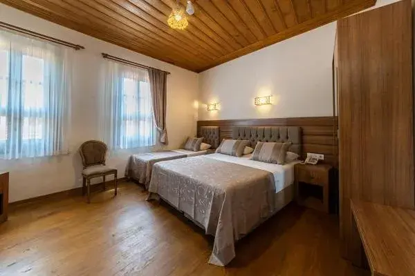 Bed in Armistis Hotel Bed in Armistis Hotel