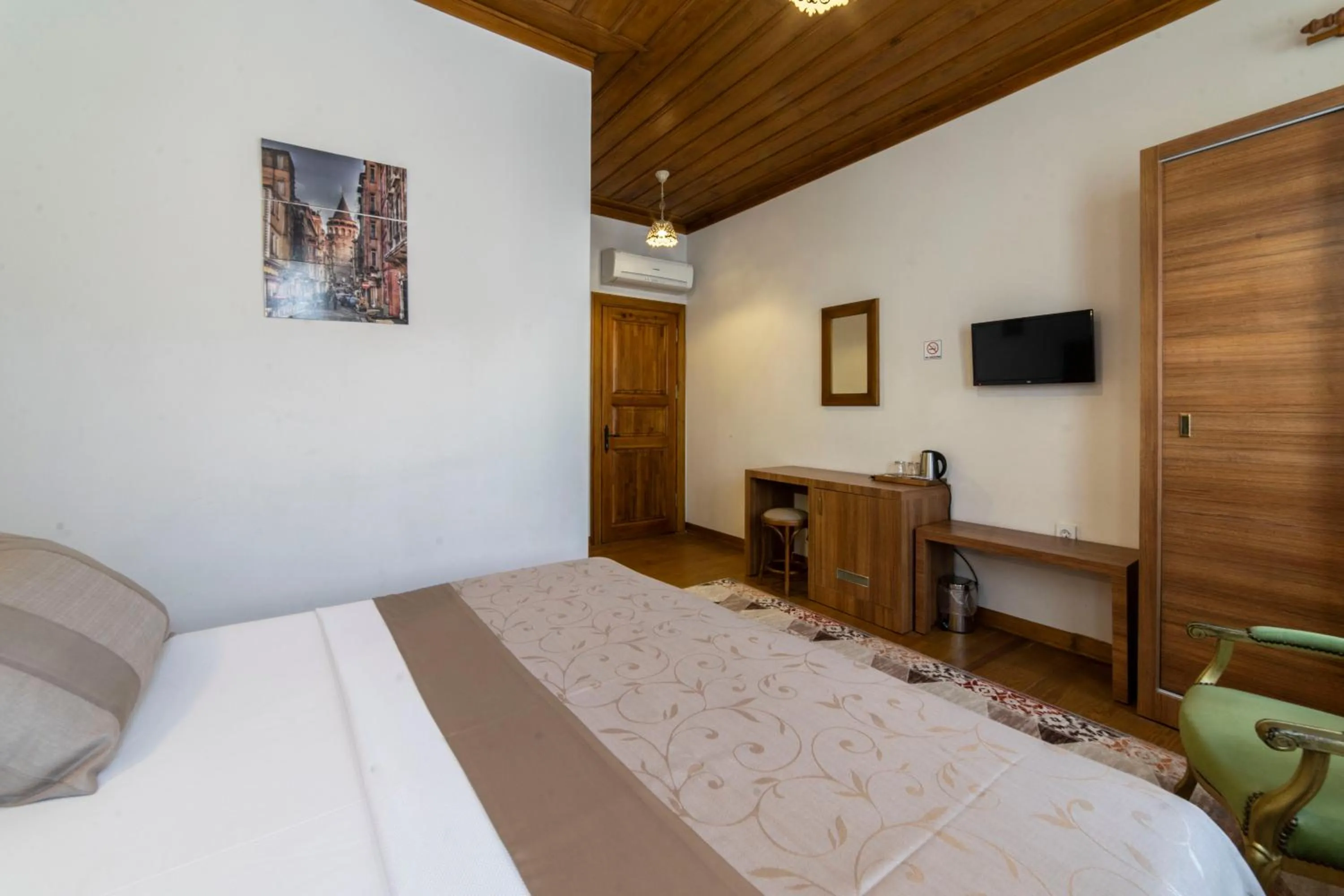 Bed in Armistis Hotel