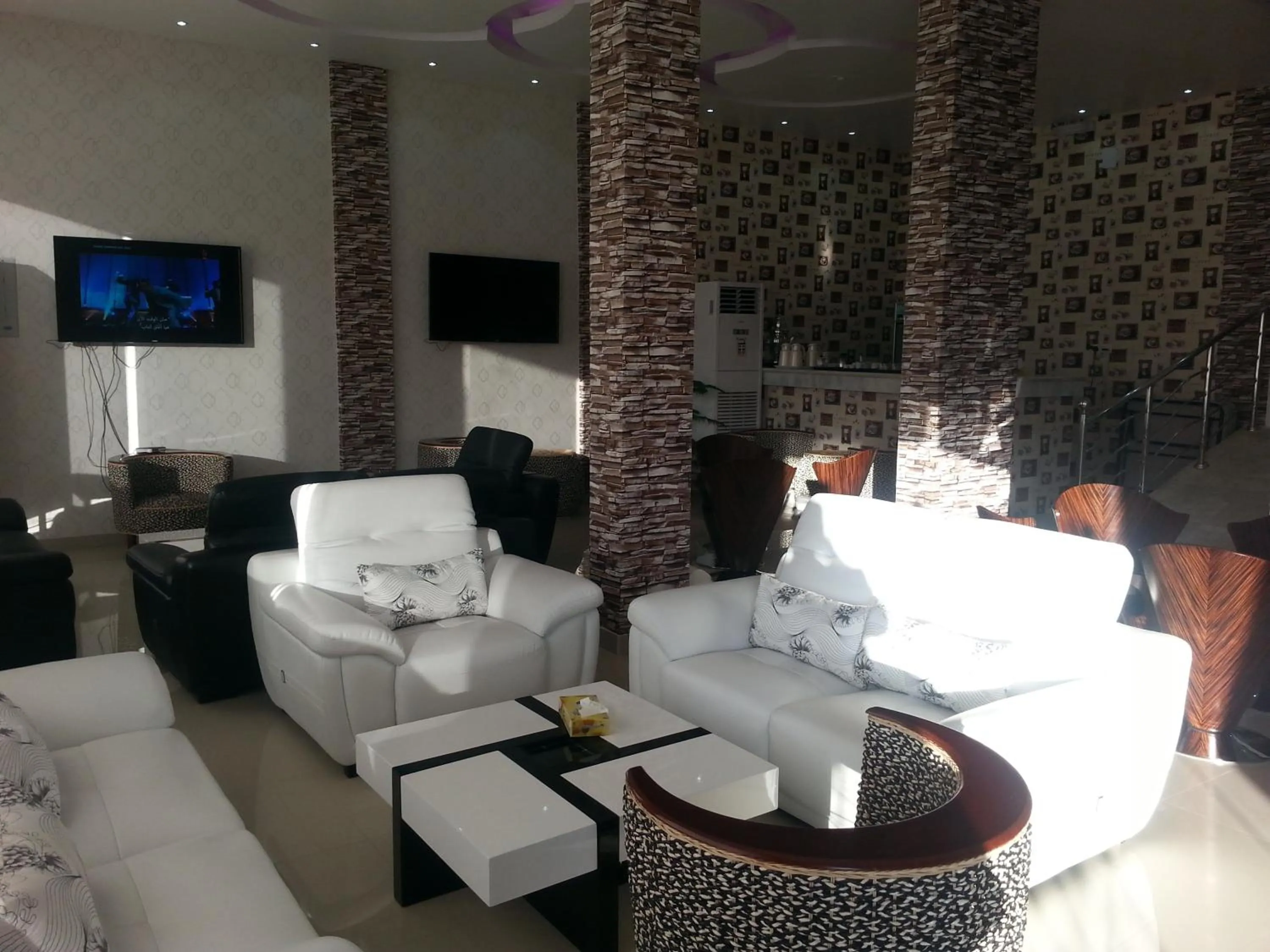 Communal lounge/ TV room in Lara Al Jawf Hotel Apartments