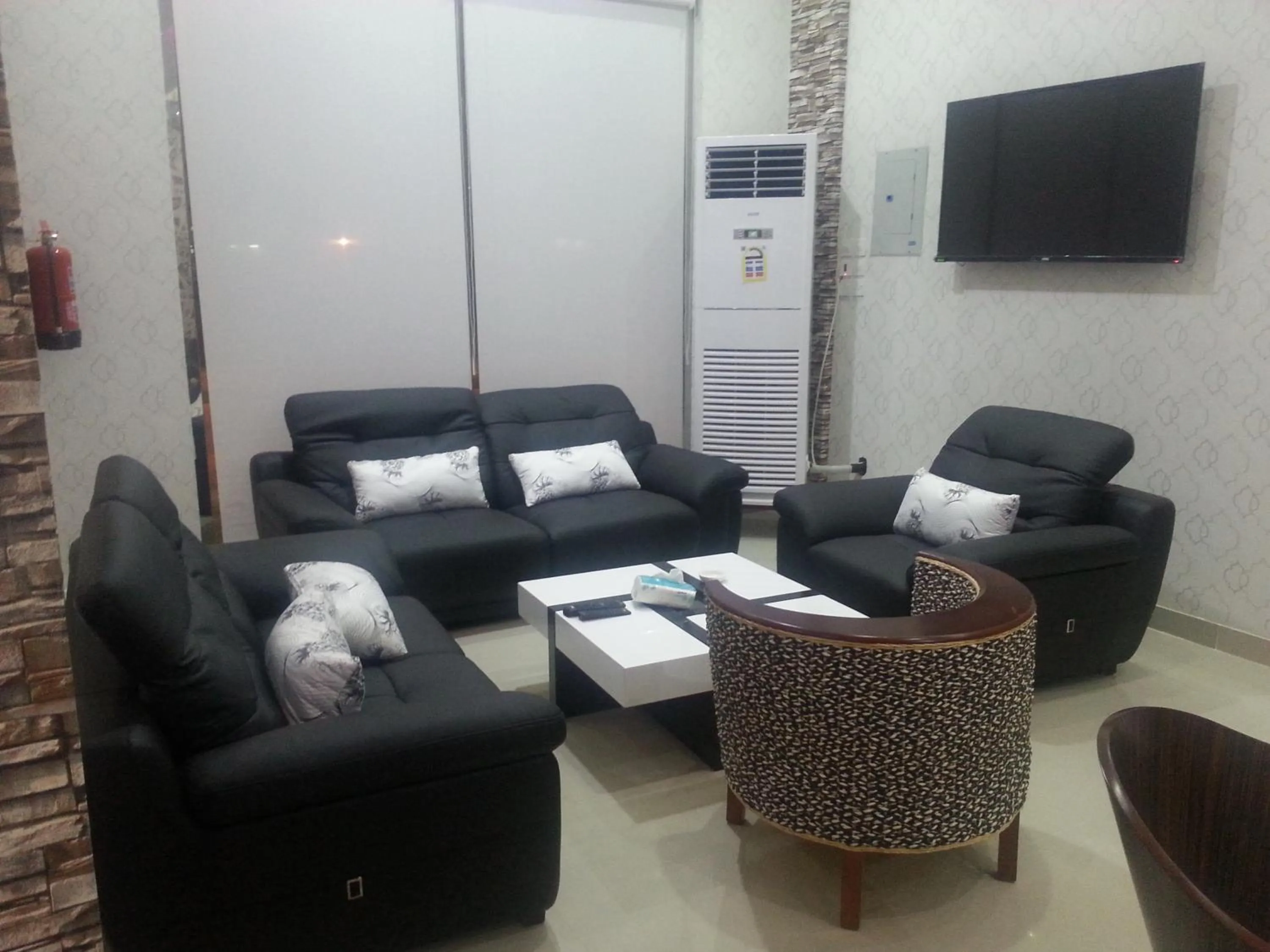 Communal lounge/ TV room in Lara Al Jawf Hotel Apartments