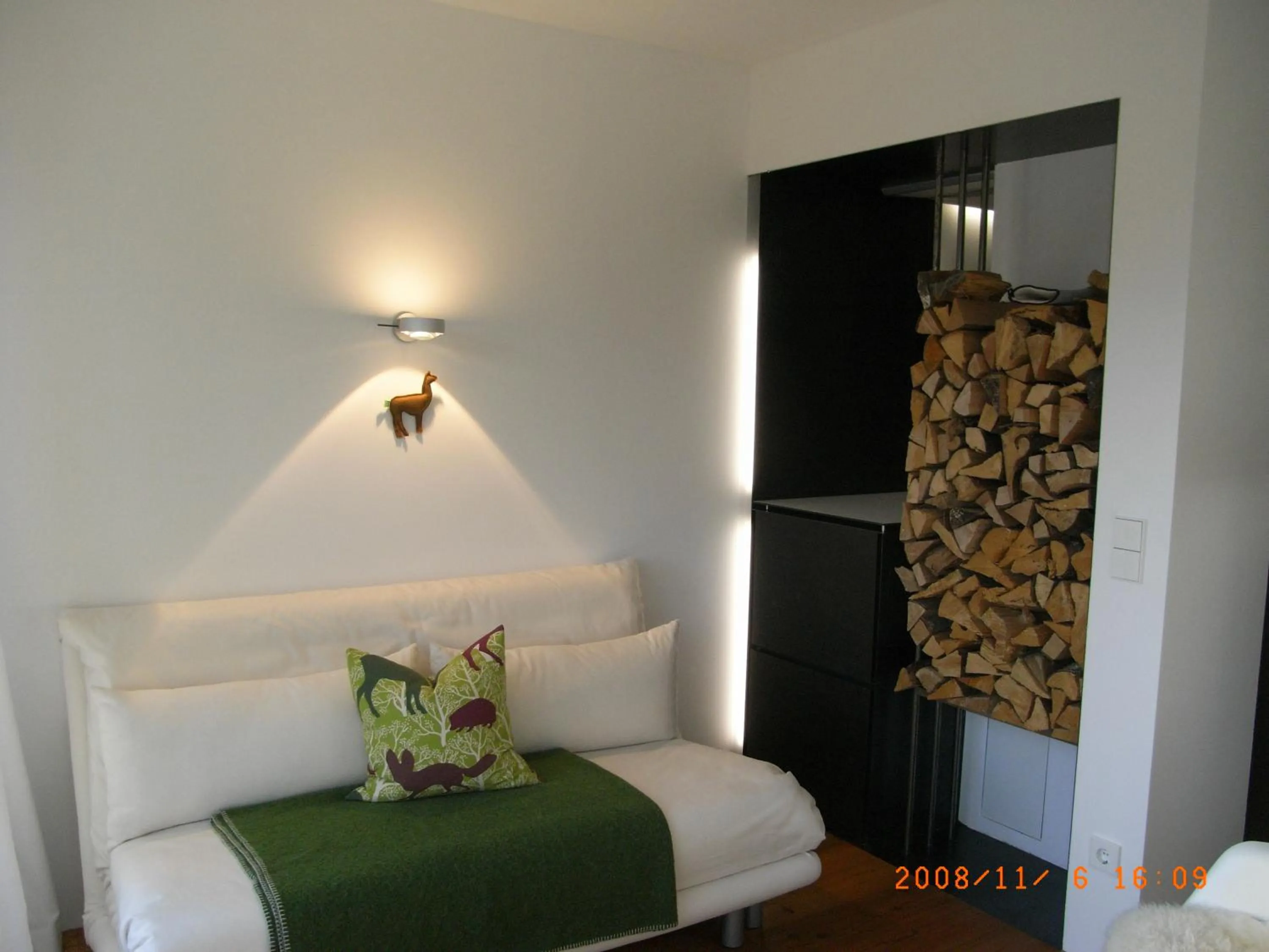 Living room, Bed in LAMA Appartement