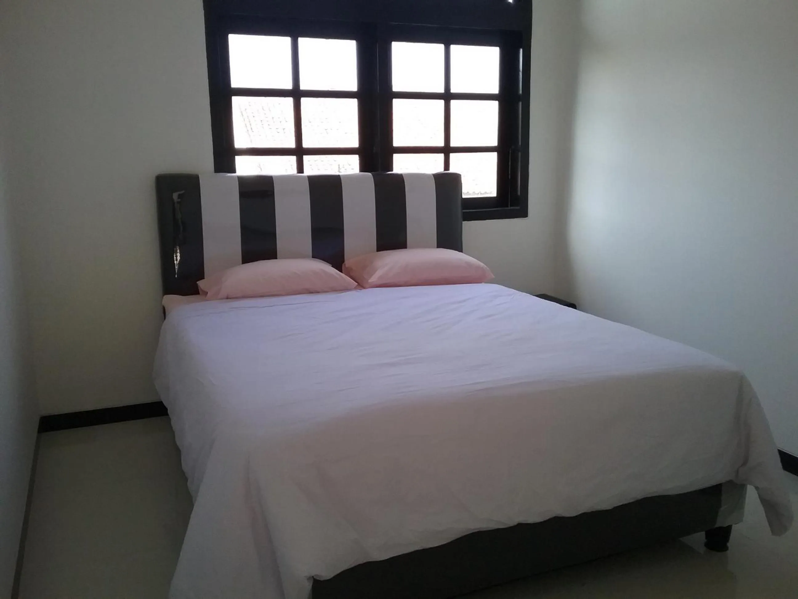 Bed in Mess Inn Semarang