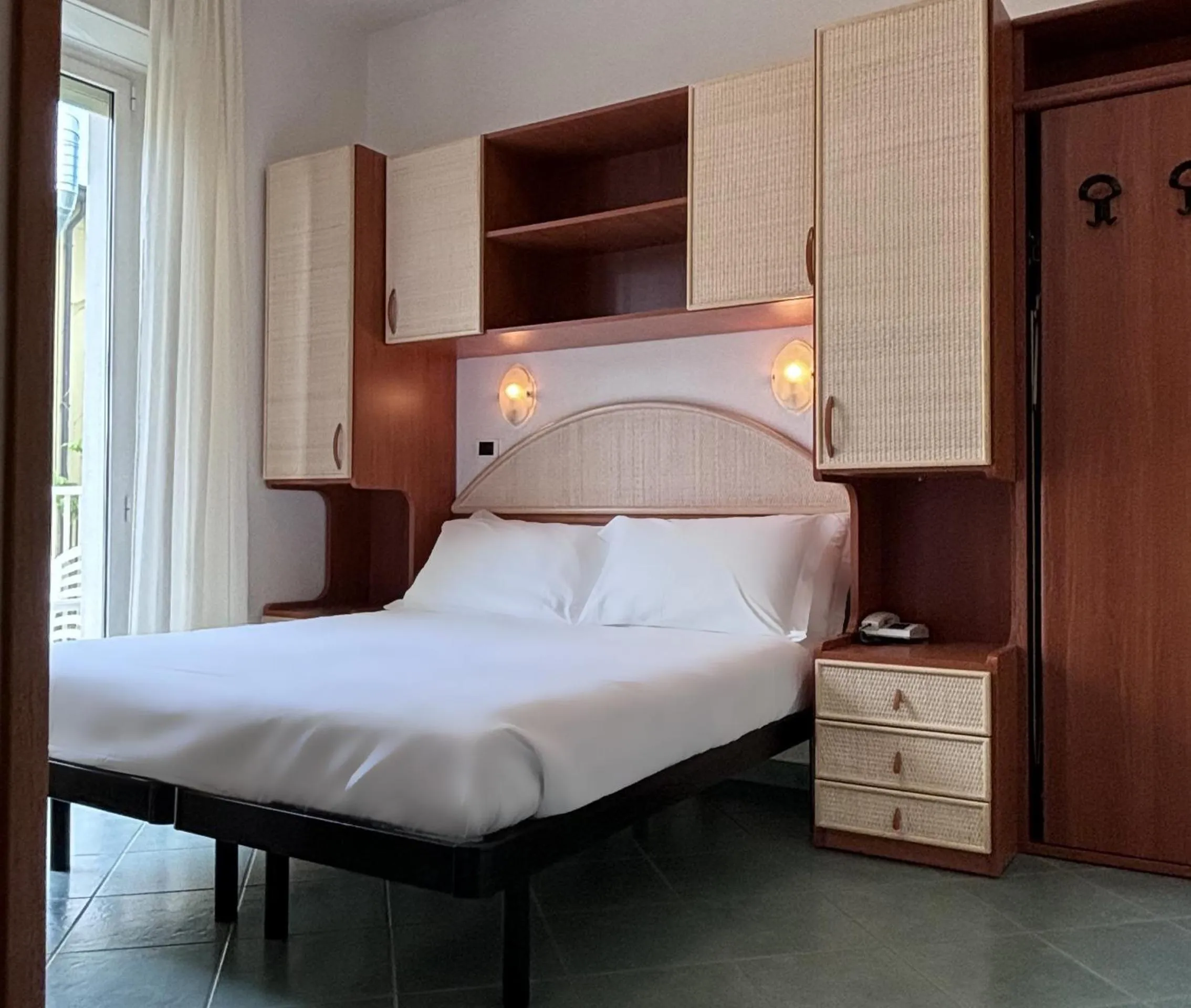 Photo of the whole room, Bed in Pinetina Mare Baby Family Hotel