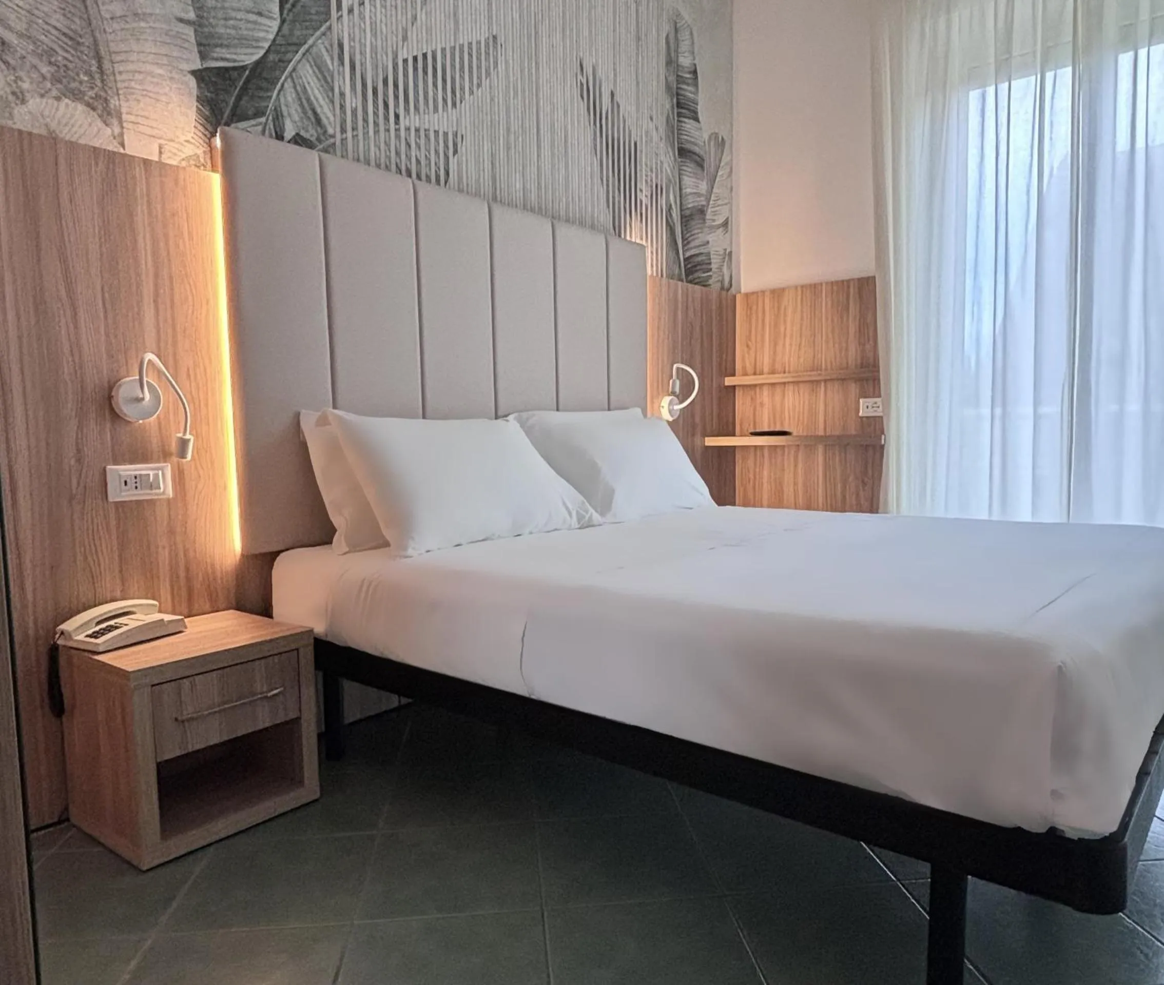 Photo of the whole room, Bed in Pinetina Mare Baby Family Hotel