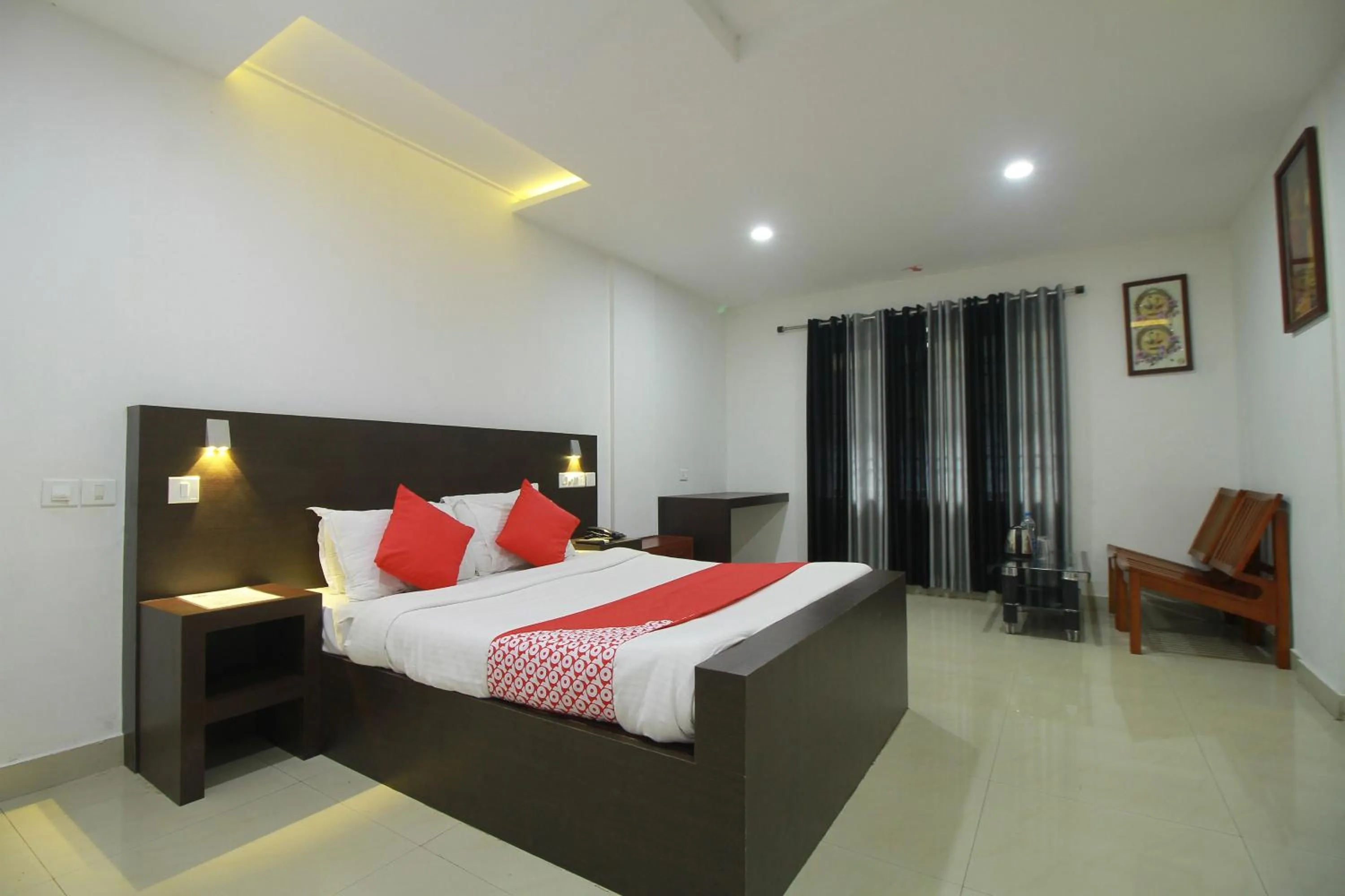 Bed in Half Moon Residency Calicut