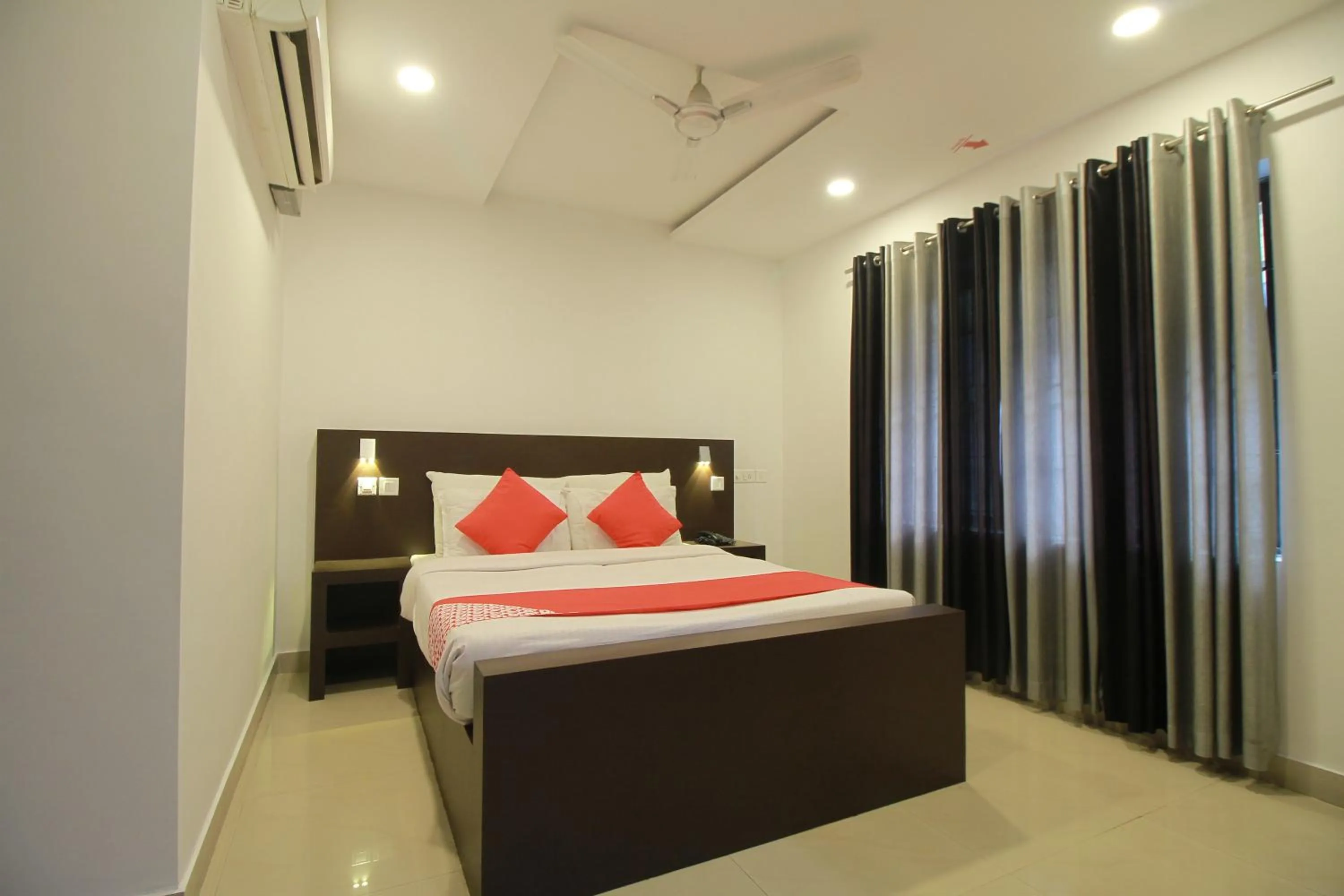 Bed in Half Moon Residency Calicut