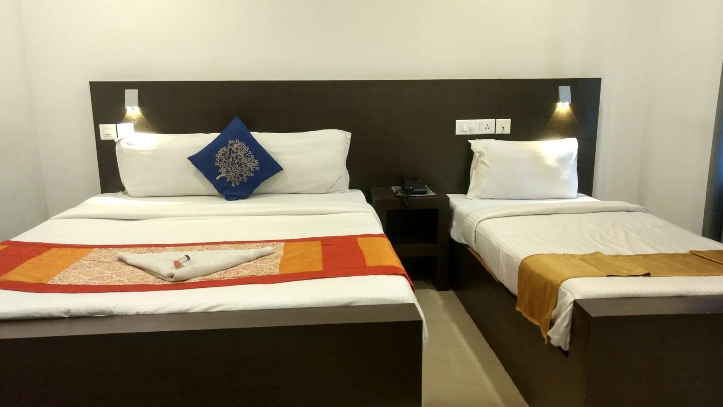 Bed in Half Moon Residency Calicut