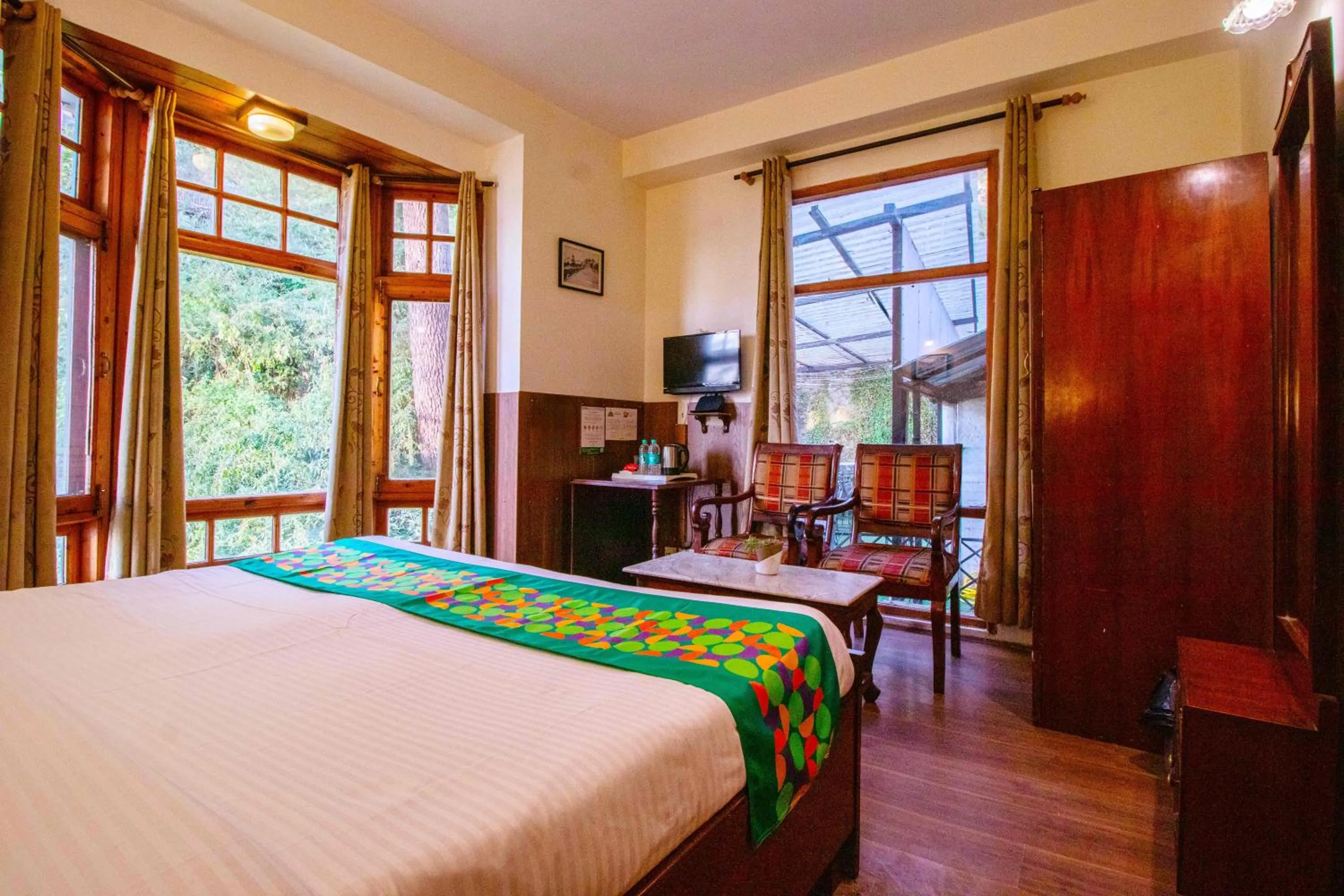 Bedroom, Bed in Treebo The Alpine Heritage Residency